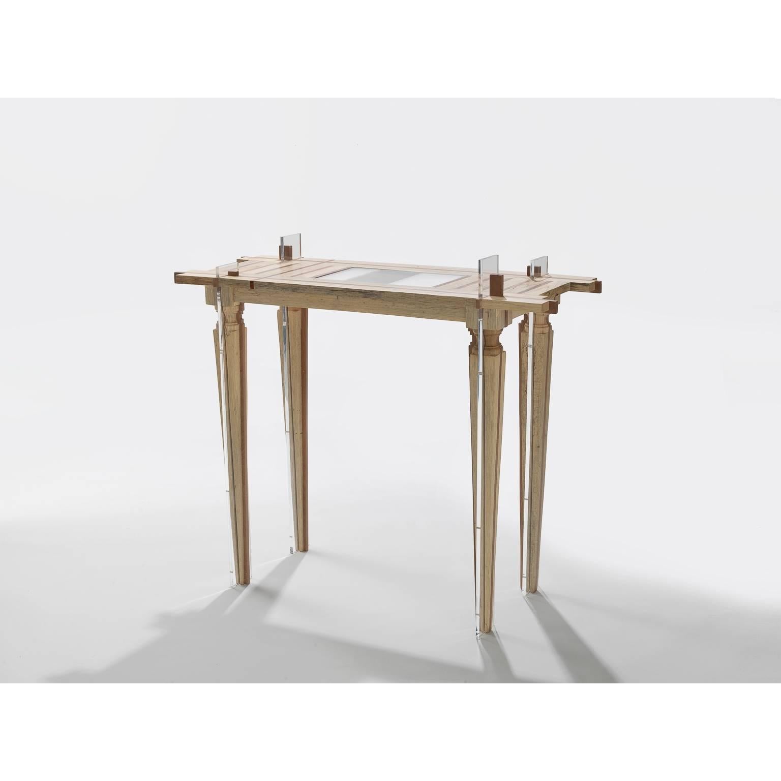 This contemporary console table is made of handcrafted Amazonian woods (Jequitiba and Cacheta muerta) and acrylic.

This piece is the result of artisanal production process, which makes it extremely unique. Therefore, any irregularities should not
