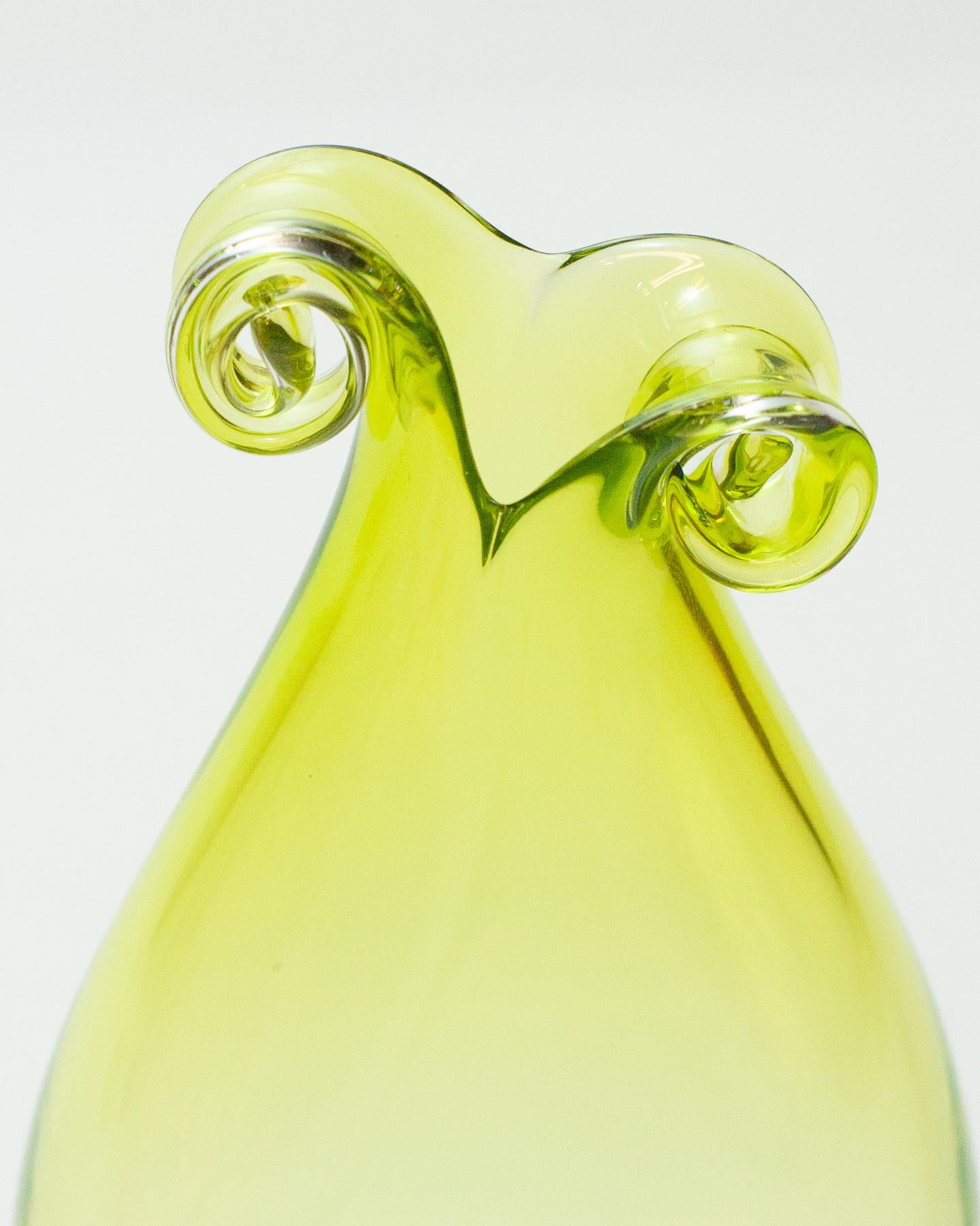 A stunning contemporary lime green blown glass curly vase by a Canadian artist.