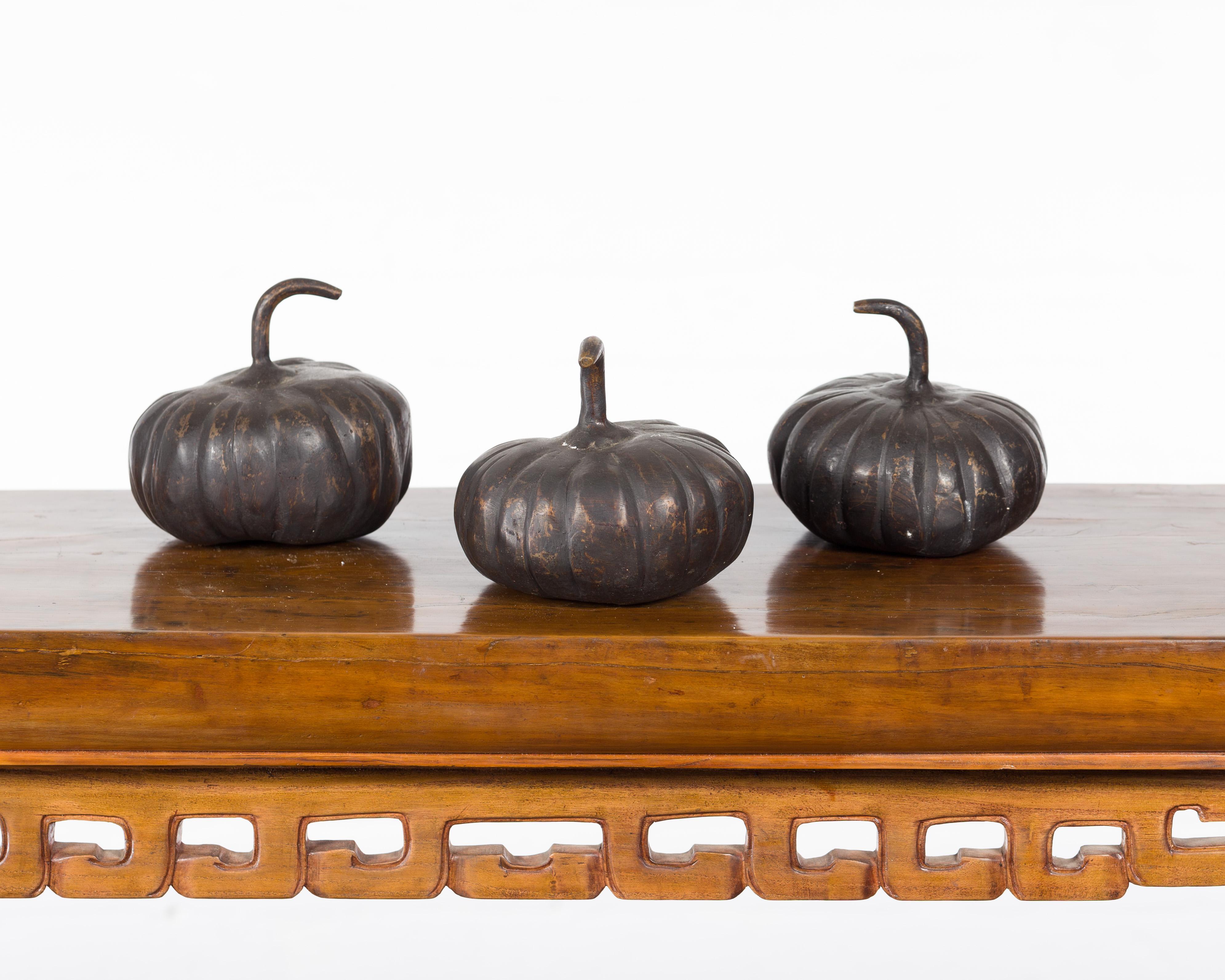 Three contemporary small lost wax bronze pumpkin sculptures with dark patina, priced and sold individually $175 each. Created with the traditional technique of the lost-wax (à la cire perdue) which allows for great precision and finesse in the