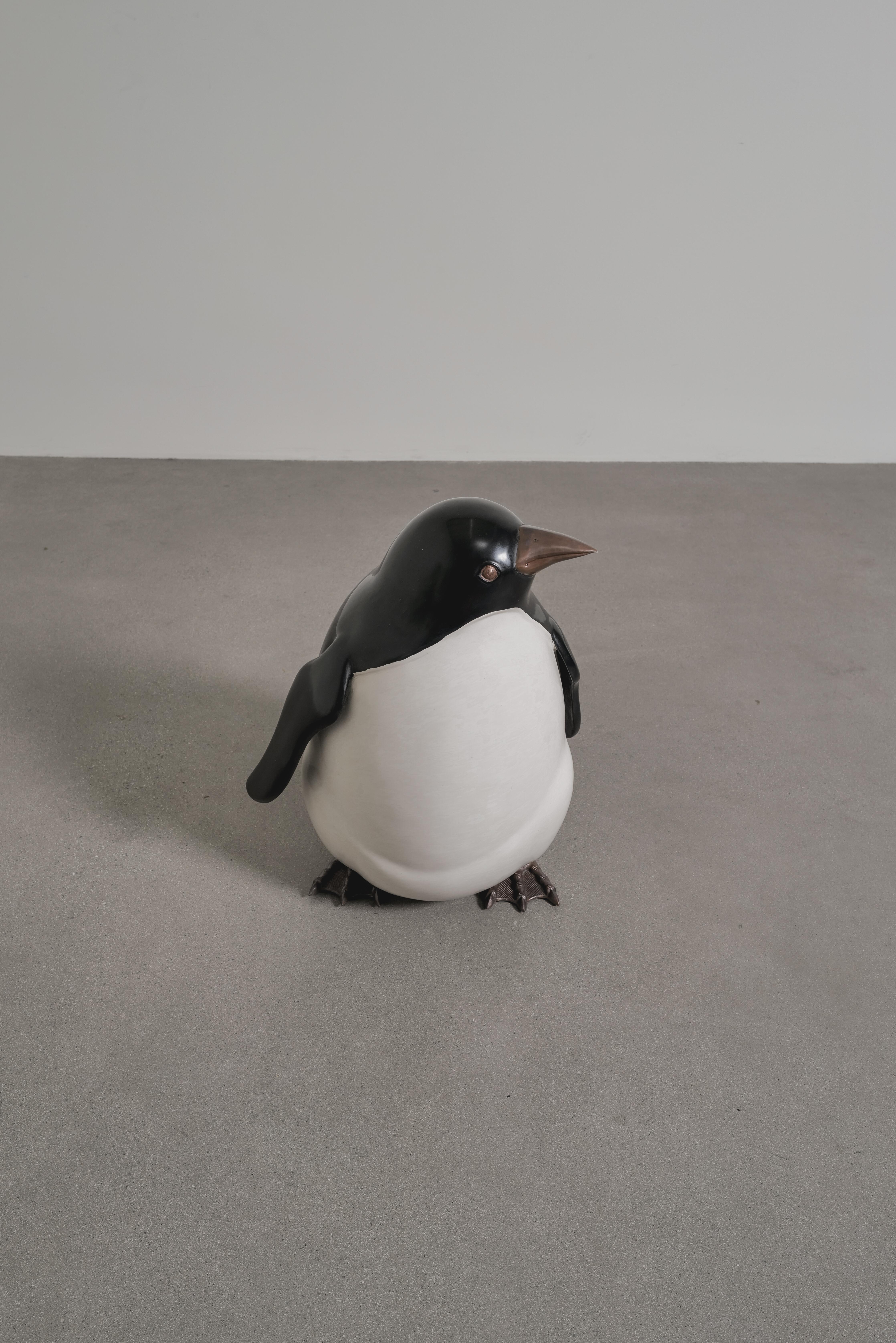 Penguin (Small)
Black Lacquer
Cream Lacquer
Antique Copper
Hand Repoussé
Limited Edition
Contemporary
Sculpture has a lacquered body and exposed copper beak and feet which can patina over time. 

Repoussé is the traditional art of hand-hammering
