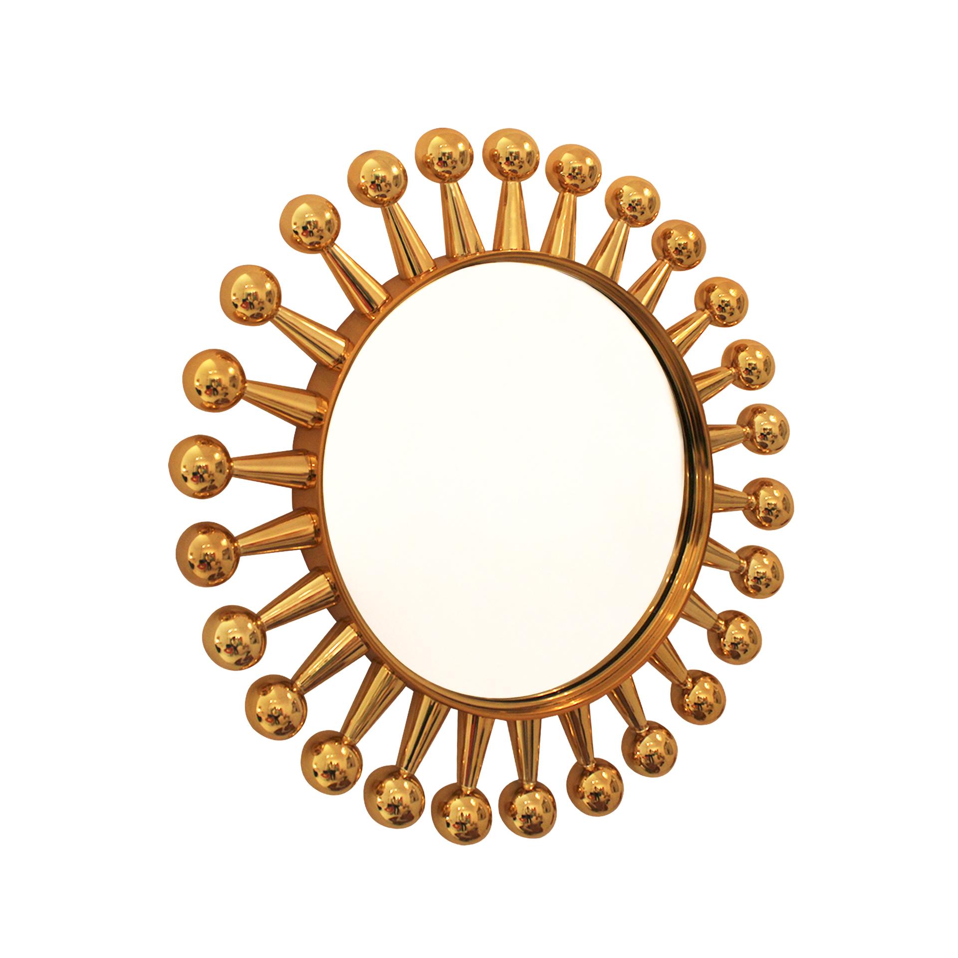 Lo specchio Jack di Jonathan Adler è realizzato in ottone lucido, per una finitura brillante.

Il suo design a stella, con aste in ottone che si irradiano dal bordo centrale e terminano in sfere decorative, crea un effetto visivo suggestivo e