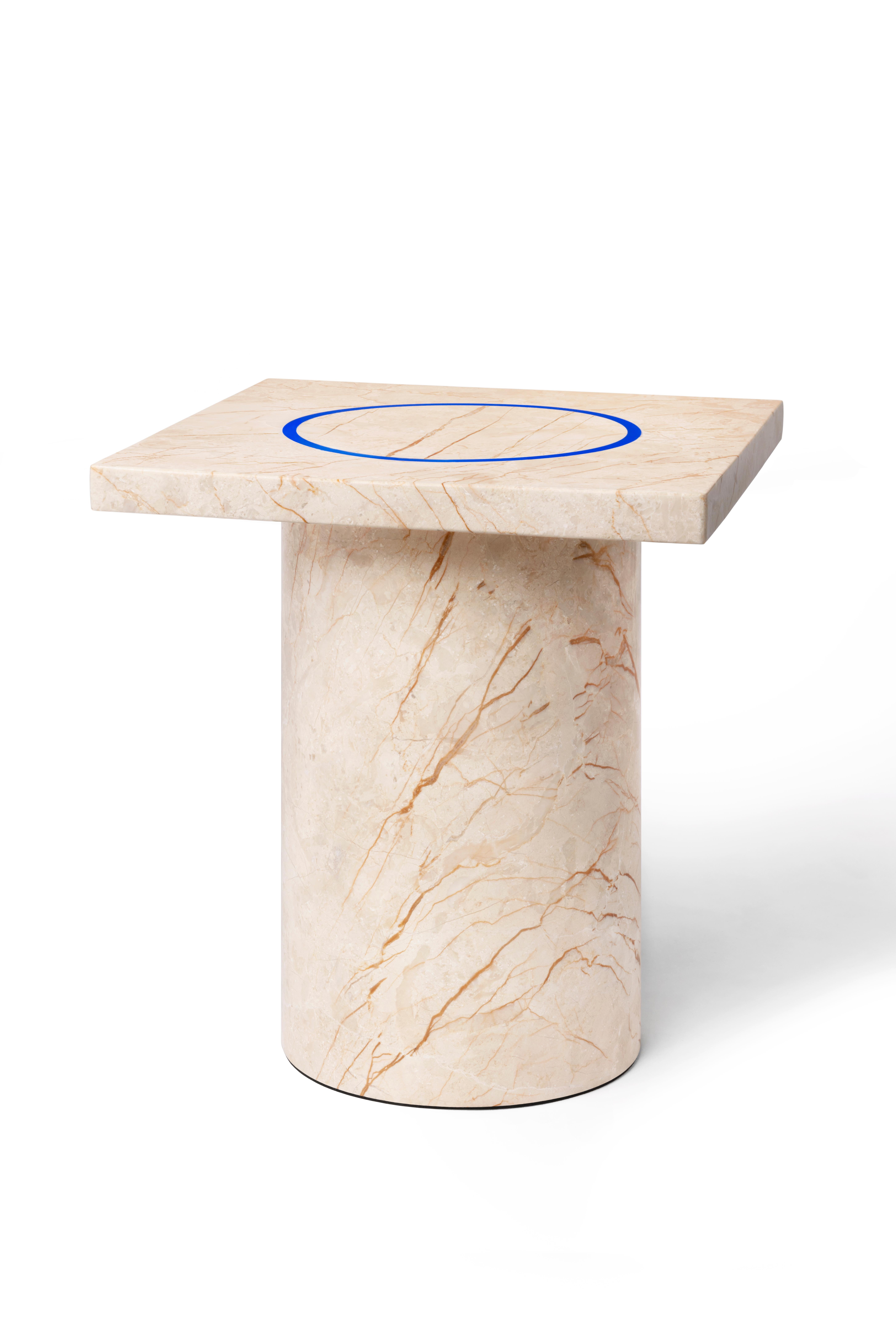 'DISLOCATION' collection by Buzao, small table
Golden Sunset marble, blue acrylic
Measures: 40 x 40 x H 38 cm

Studio Buzao from Guangzhou (China) is exploring innovation with furniture and lighting design. From marble to lava stone, from