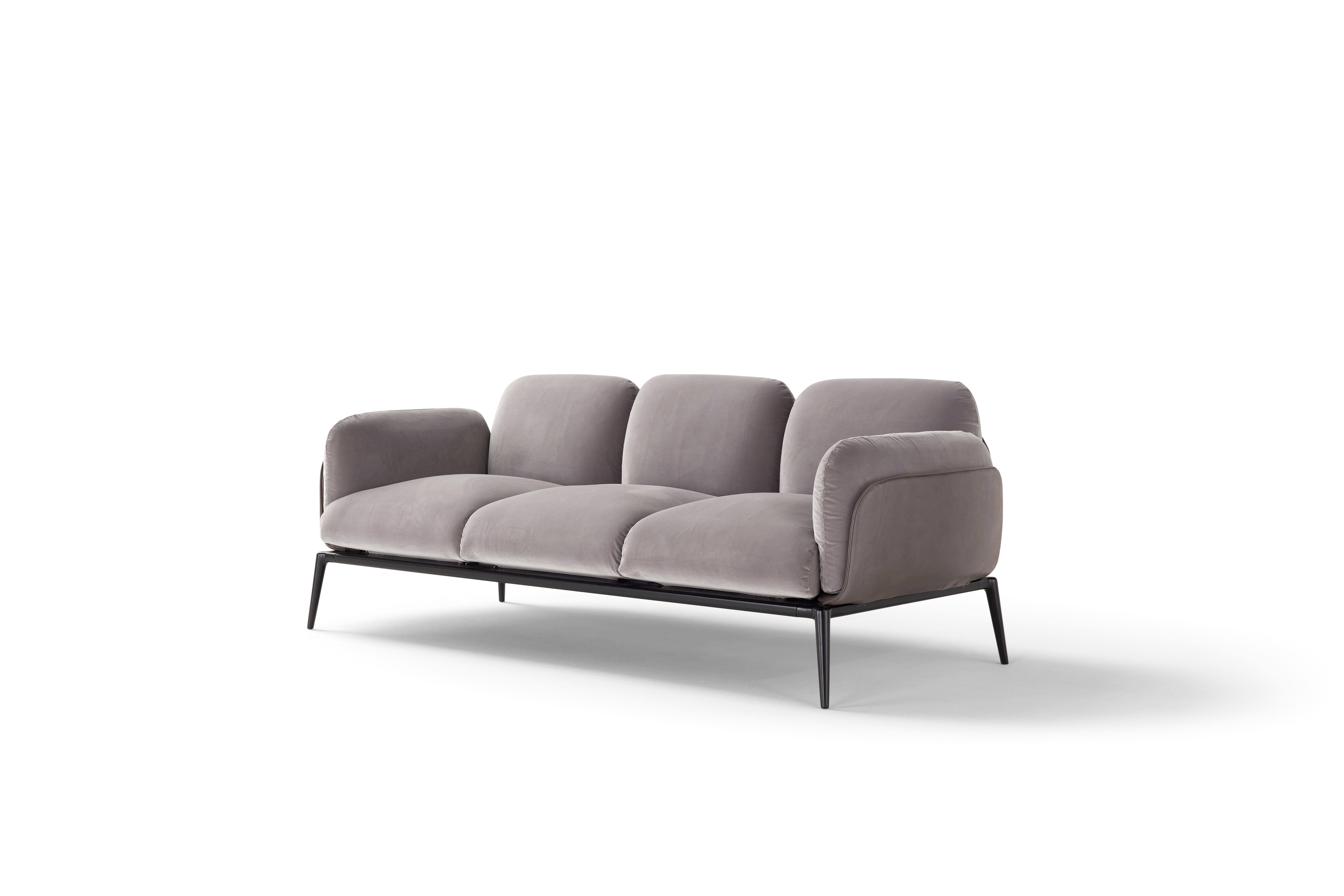 'Brooklyn' is a collection of sofas and armchairs. 
Designer: Stefano Bigi
Maker: Amura Lab 
Model: Brooklyn Sofa 030
Fabric shown on main image: Nobilis col.21 + Daino col.04

The strong personality of the BROOKLYN seats, is born out of the meeting