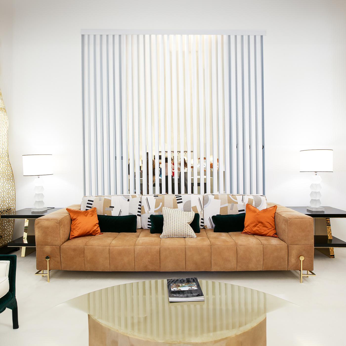 A comfortable and sophisticated solution for a refined and contemporary interior environment, this splendid sofa features a capacious and welcoming shape, softly padded and upholstered with first-rate Nabuk leather. Crafted of steel, the structure