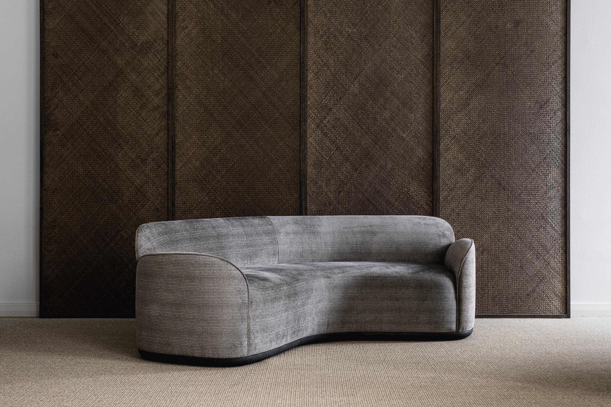 Unio Curved sofa by Poiat 
Designers: Timo Mikkonen & Antti Rouhunkoski 

Collection UNIO 2023

Dimensions: H. 72 x W. 220 D. 110 cm SH. 40 (3 seaters)
Model shown: Tiger Mountain Graphite - Dedar
 
The Unio Collection, featuring an armchair