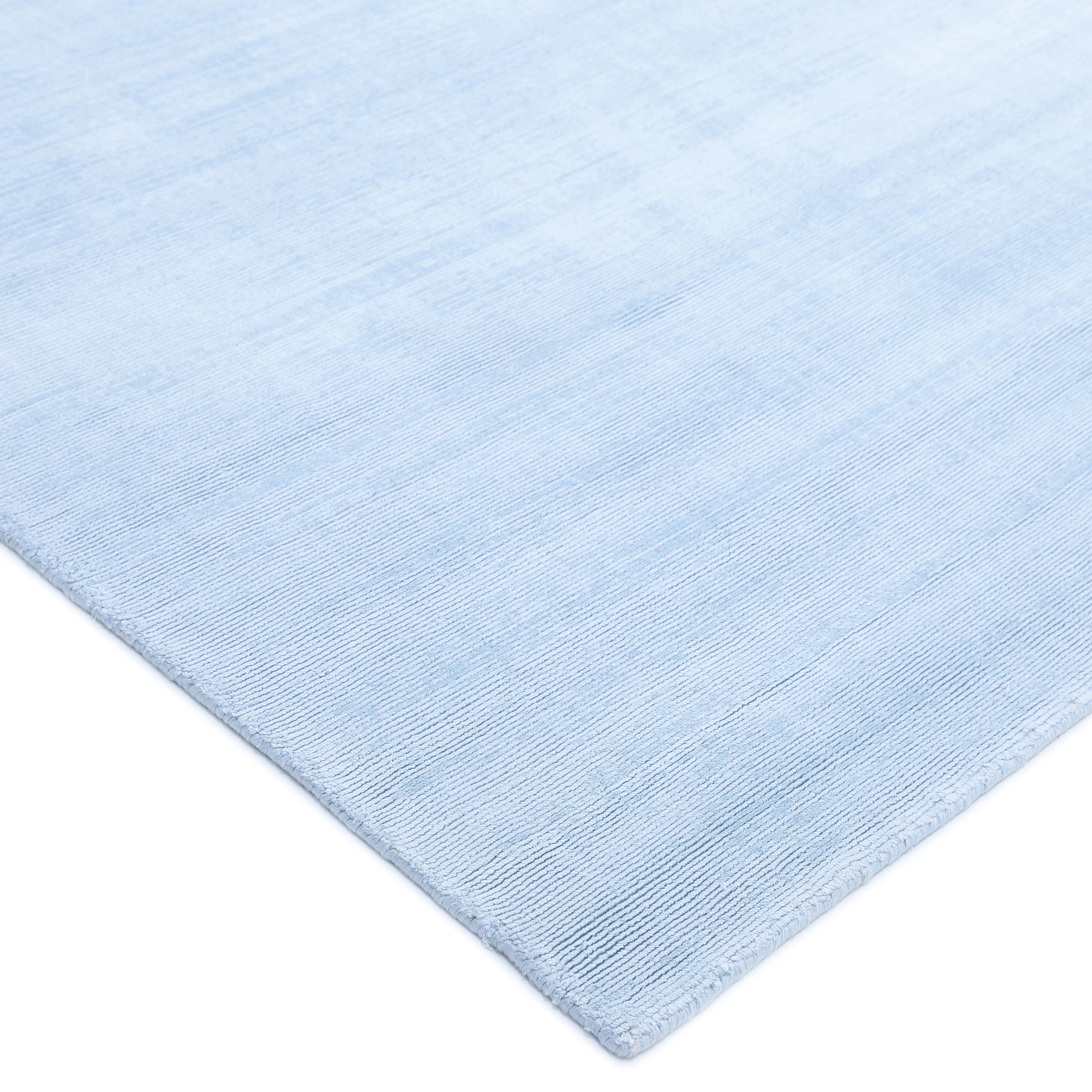 Subtle tone-on-tone stripes give the Solid collection a depth and sophistication all its own. These rugs can pull the disparate elements of a room into a beautifully cohesive whole; they can also introduce an unexpected but welcome jolt of color