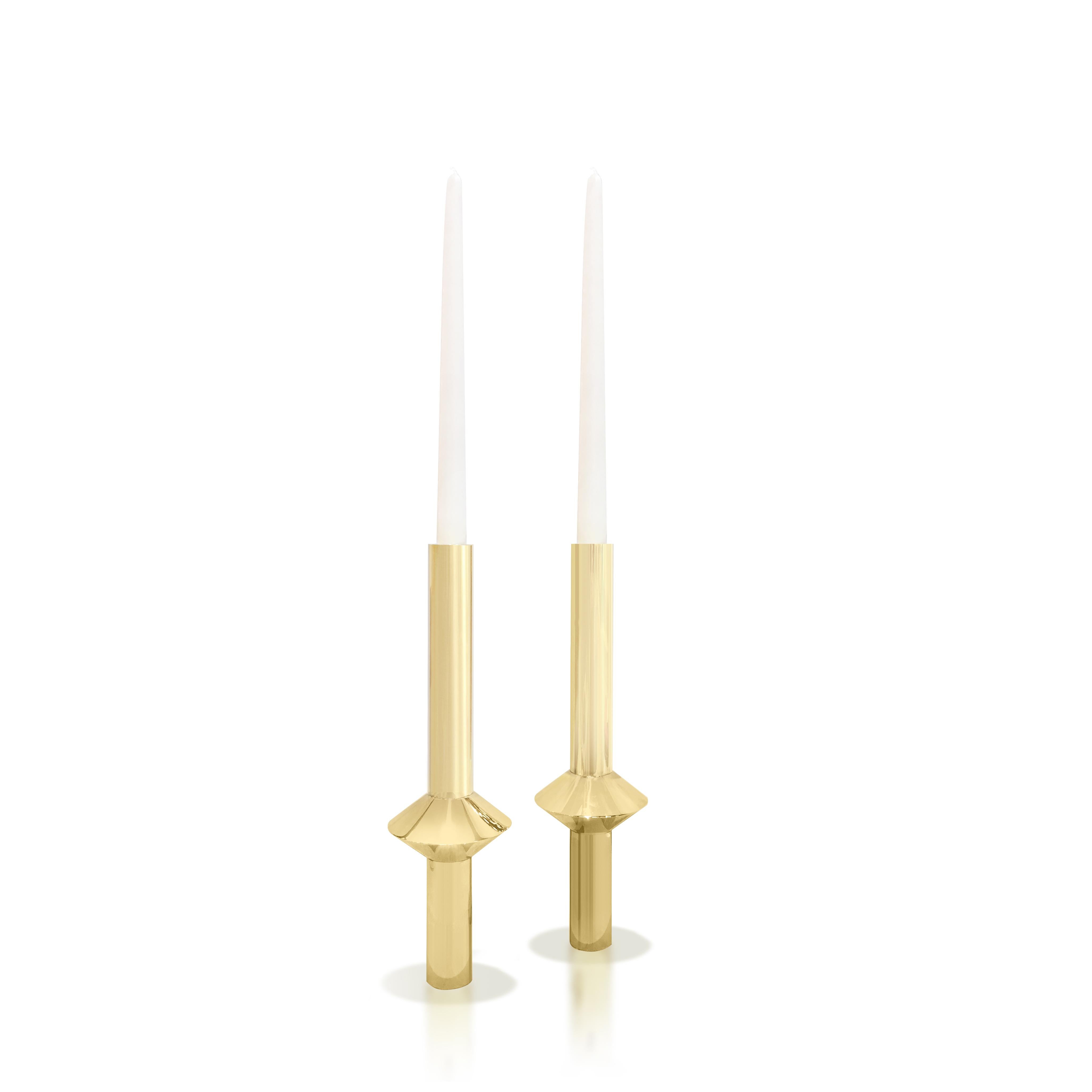 Part of Les Few's Annette collection, these contemporary, Minimalist candlesticks, are made by artisans in Sweden. They come in a polished or brushed finish.