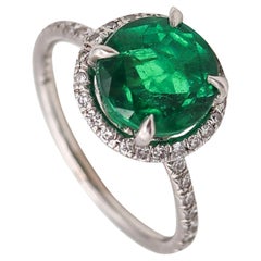 Anello solitario CONTEMPORANEO in platino con 2,57 carati di smeraldo e diamanti