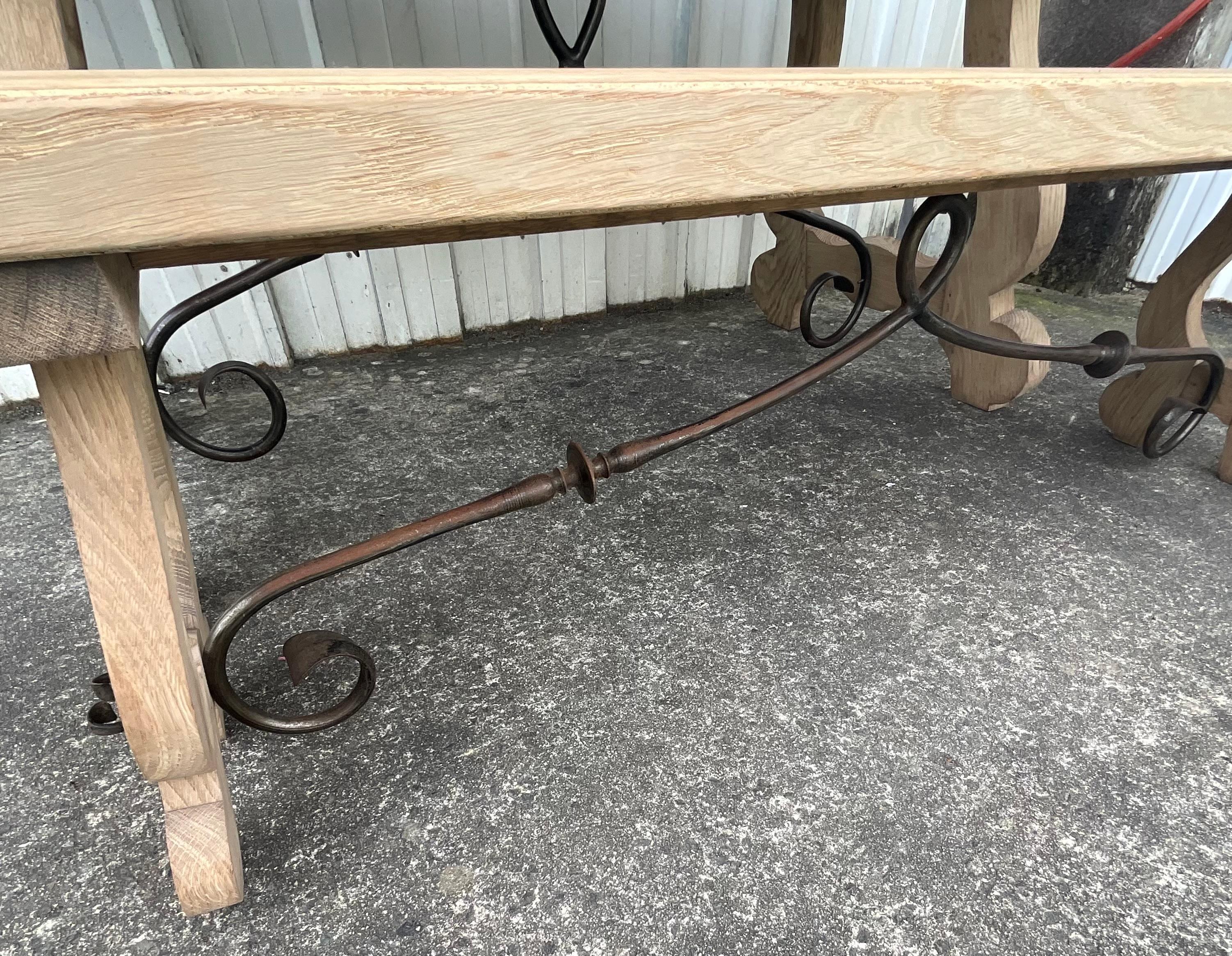Contemporary Spanish-Style Oak Dining Table and Bench with Wrought Iron Stretche Francés en venta