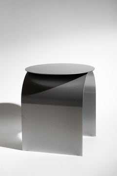 Contemporary Spinzi Palladium metal side table in Hammered Grey with round top