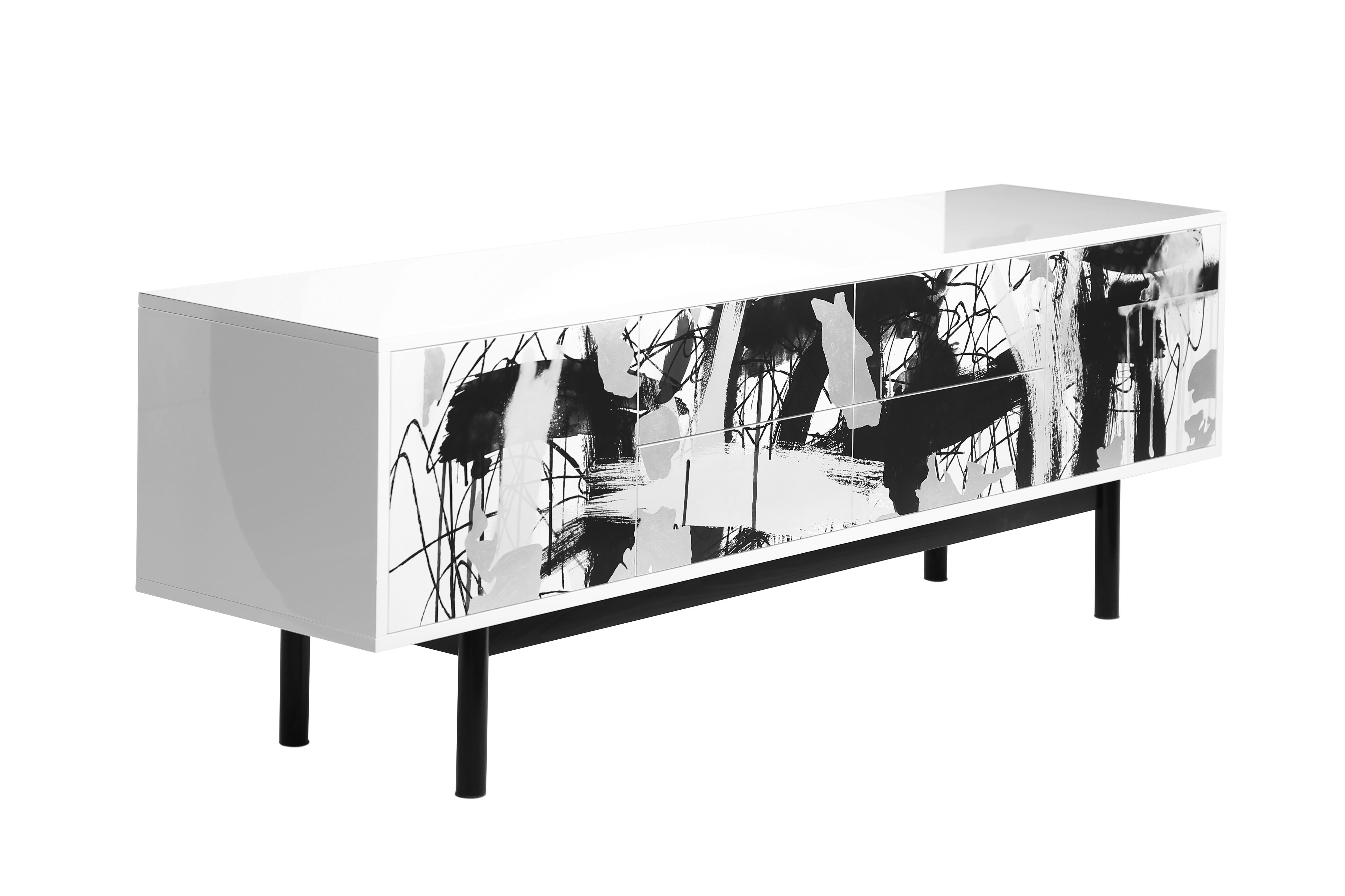 Worthy of its own award show! A modern mixture of function and style, the Splatter media console features clean lines, a uniquely gloss finish, and plenty of media space. This piece is also available in multiple metals and finishes

Designed by