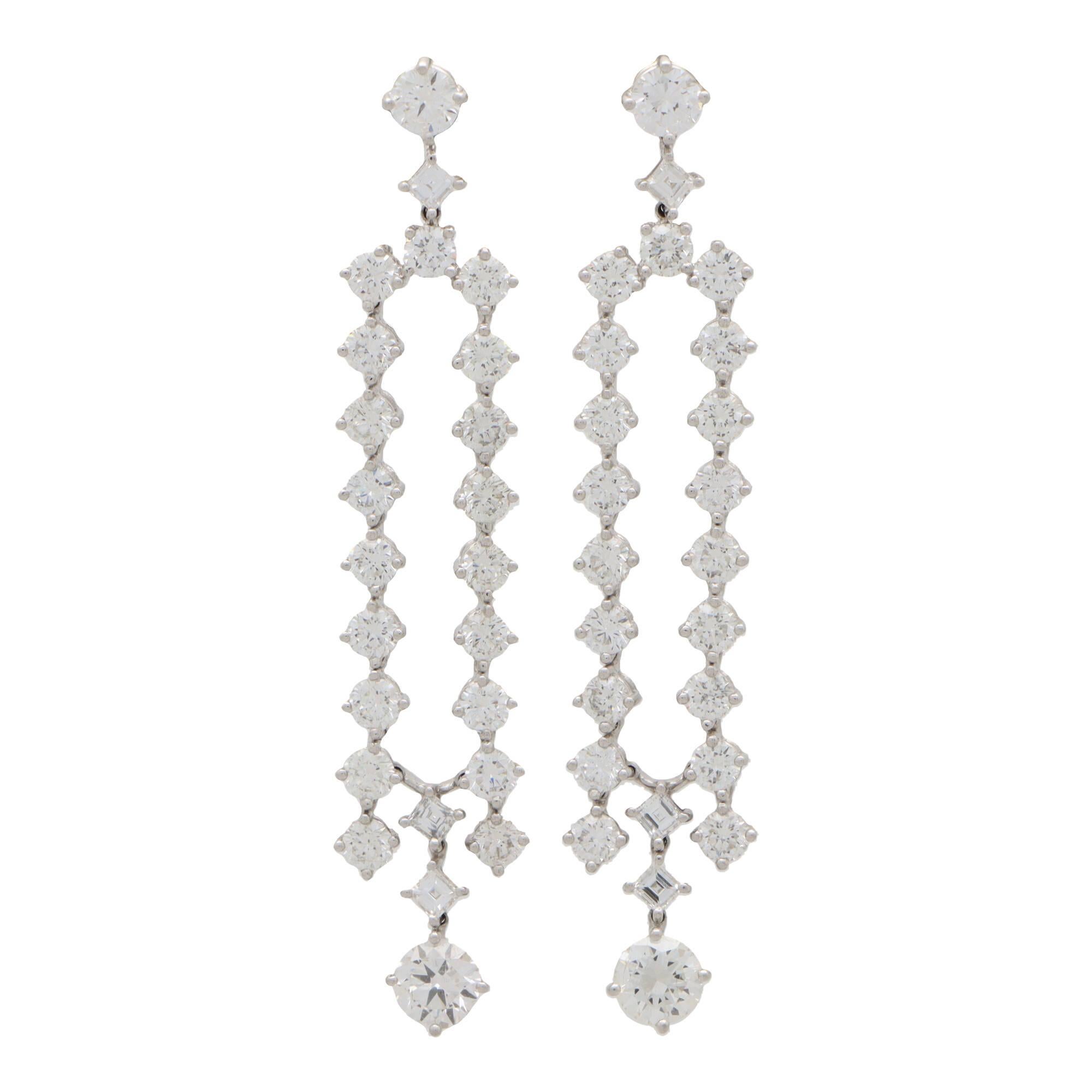 Round Cut Contemporary Split Drop Diamond Earrings Set in Platinum For Sale