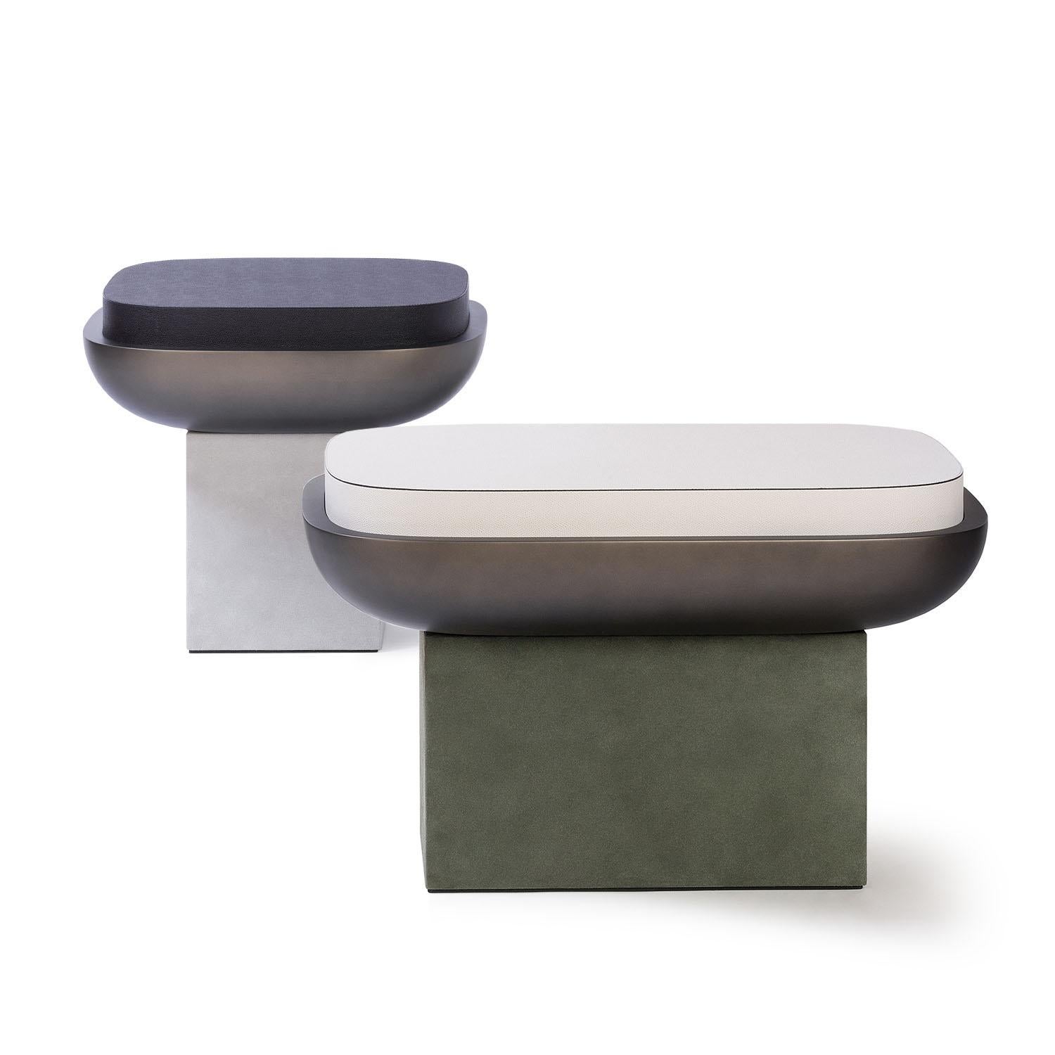 Contemporary square leather stool - Olympia by Stephane Parmentier for Giobagnara
The object presented in the image has following finish: G25 Moka Printed Calfskin Leather (top), A89 Feather Suede Leather (base) and Bronze-laquered Wood Seat