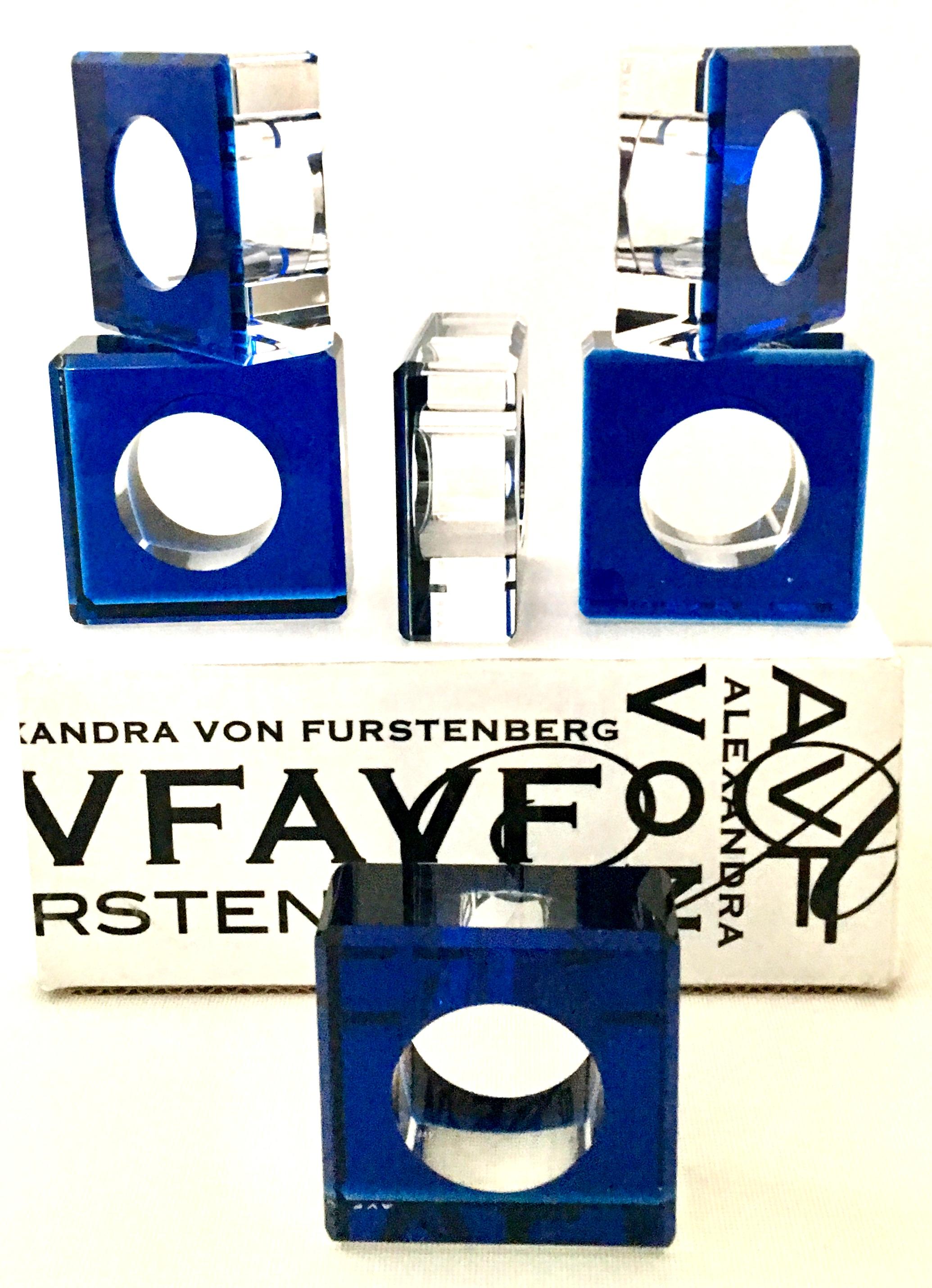 Contemporary round and square vibrant cobalt blue set of six cased Lucite napkin rings by, Alexandra Von Furstenberg. Each of the six dimensional napkin rings, signed in the Alexandra Von Furstenberg (AVF) white font logo, front exterior. This set