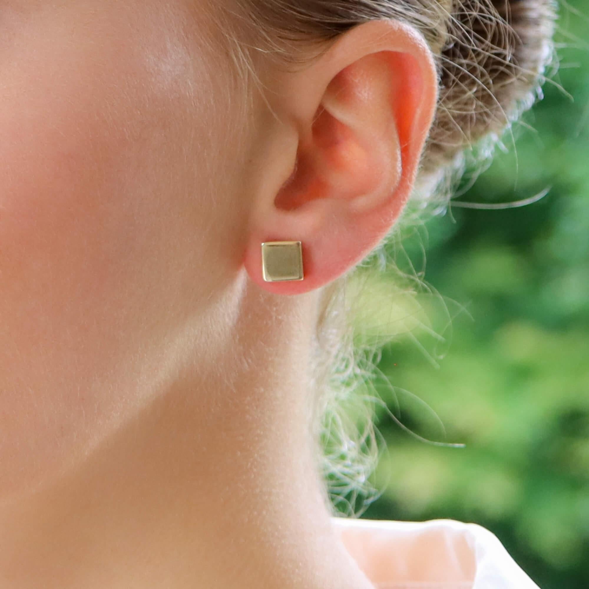 A highly unique pair of contemporary square earrings set in 18k rose gold.

Each earring is composed of a cubed motif and are made of polished rose gold which look fantastic once on the ear. Both are secured to reverse with a post and butterfly