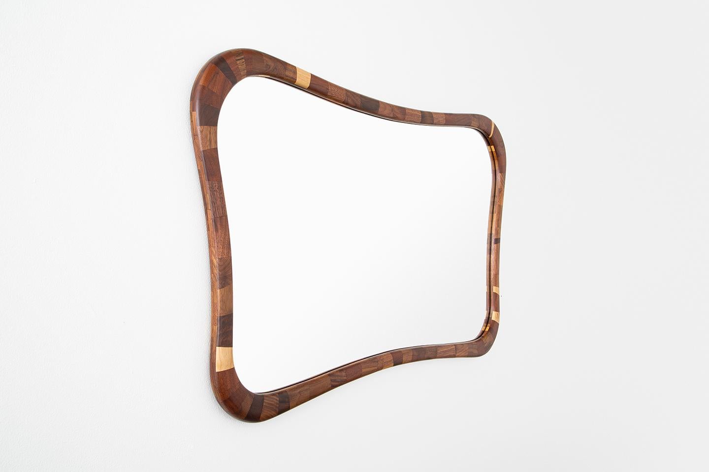 This particular mirror's rectilinear STACKED frame is made from salvaged Walnut. All frames are hand-built custom per your specifications. Rectilinear like this one, oval, scalloped, horizontal or vertical, larger or smaller, or whatever you may