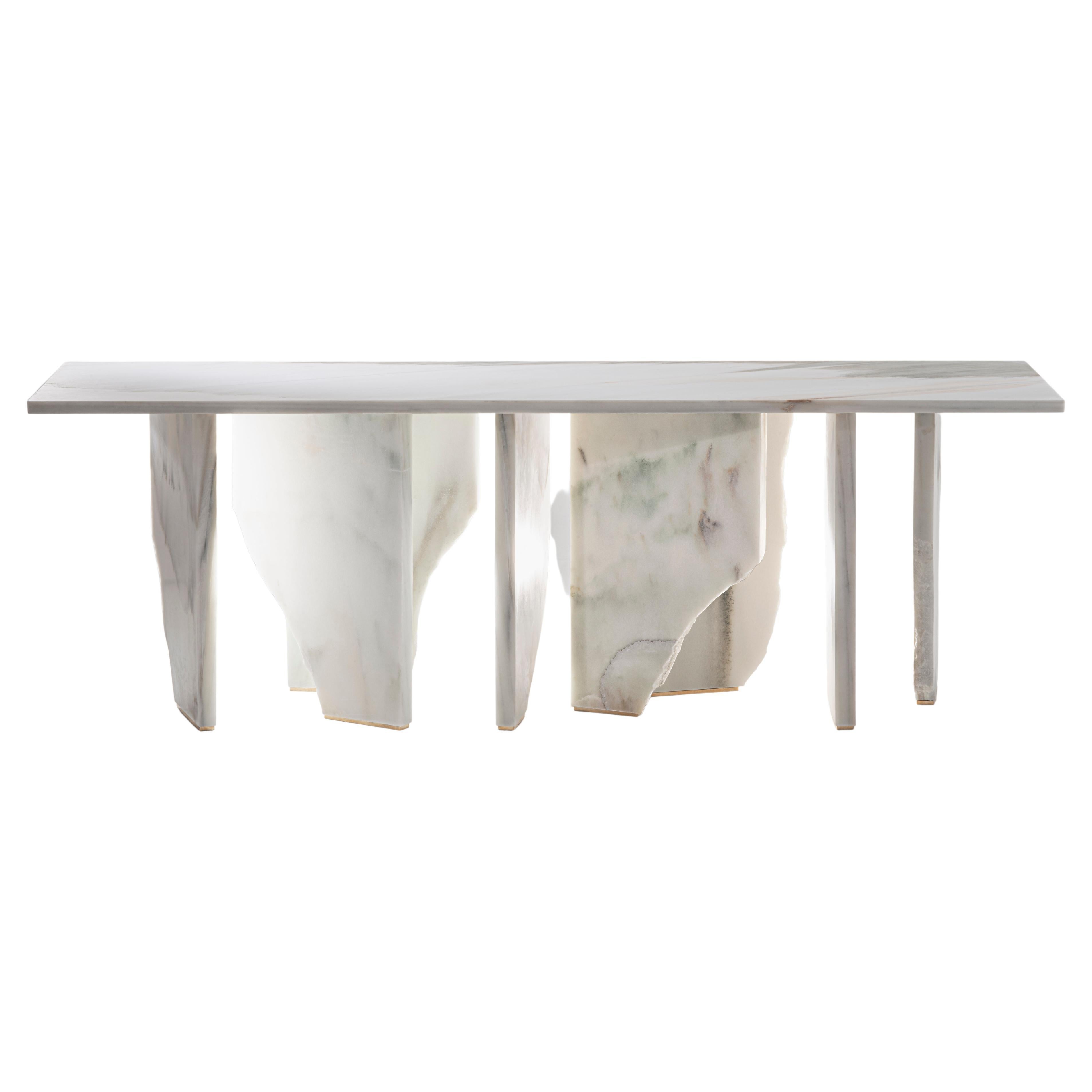 New white Statuario marble monumental console designed by Josep Vila Capdevila. Like a monumental iceberg, the Arctic Console made with white Spanish marble seems to float in the space. A unique piece made out of solid marble from the South of