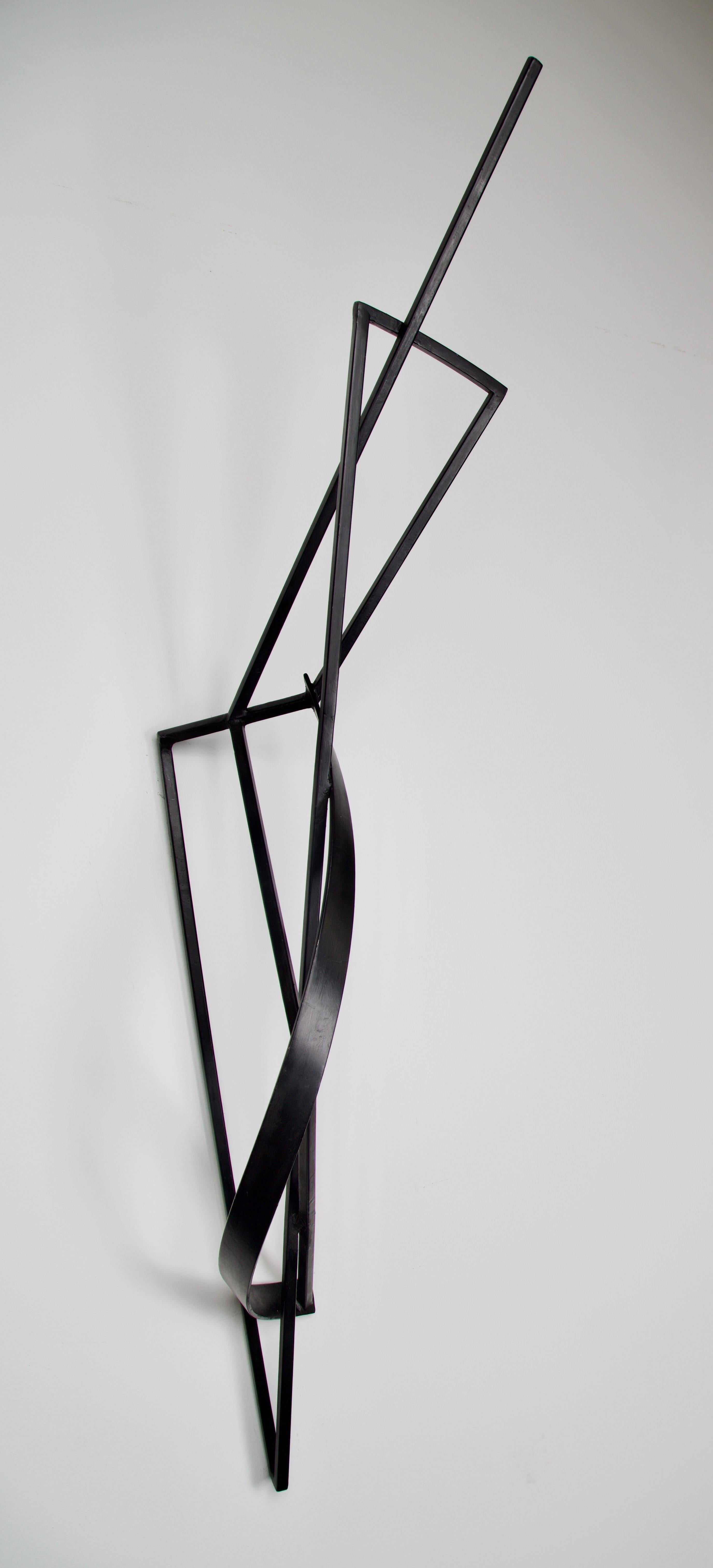 Contemporary steel wall sculpture signed by Tom Hollenback titled Leaning Figure. Signed and dated on the back.

Like the best artists of any era, Tom Hollenback creates art that subtly transforms the perceptions of the viewer. His sculpture, no