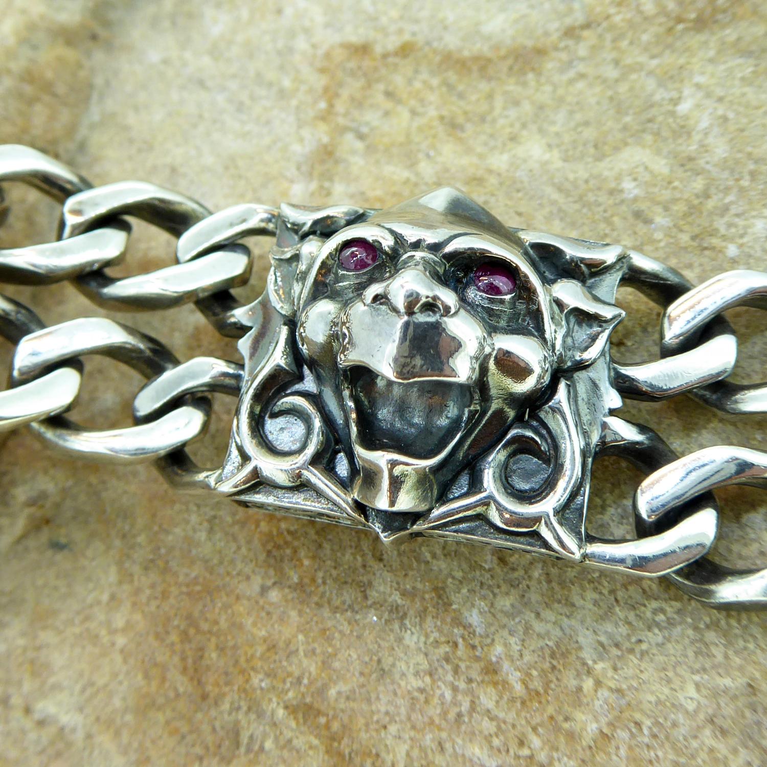 From the London Calling collection of silver jewellery for men by Stephen Webster this bracelet focuses onthe Gothic theme with its use of Gargoyle heads to create feature panel along the bracelet.  Four heads in total are evenly spread along a