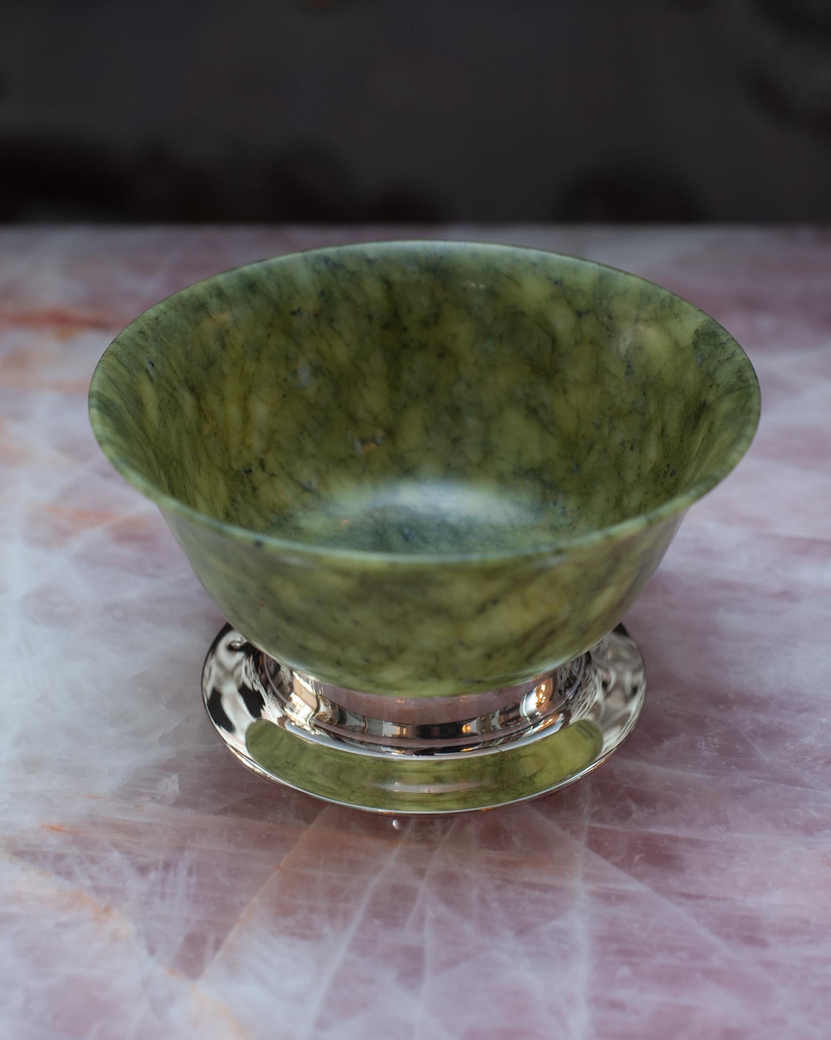 A stunning fine jade bowl on a handmade 925 sterling silver base. Expertly crafted by a master jeweller in Porto, Portugal.