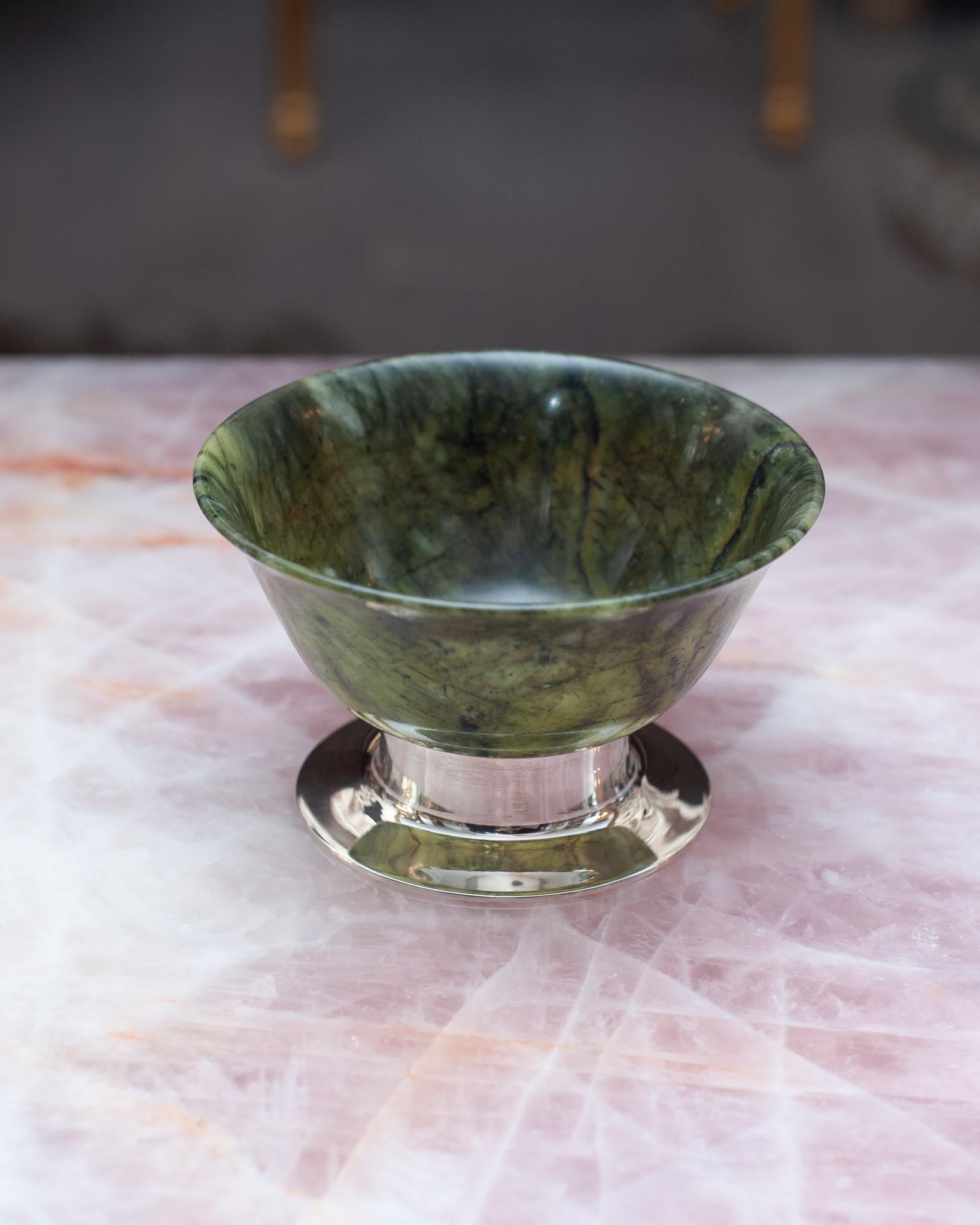 A stunning fine jade bowl on a handmade 925 sterling silver base. Expertly crafted by a master jeweller in Porto, Portugal.