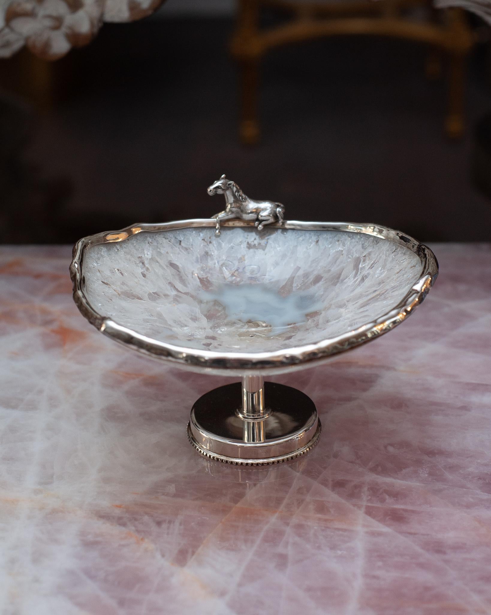 A gorgeous rock crystal and agate footed bowl with sterling silver rim and base, featuring a horse perched on its edge. Expertly crafted in Portugal by a master jeweller.