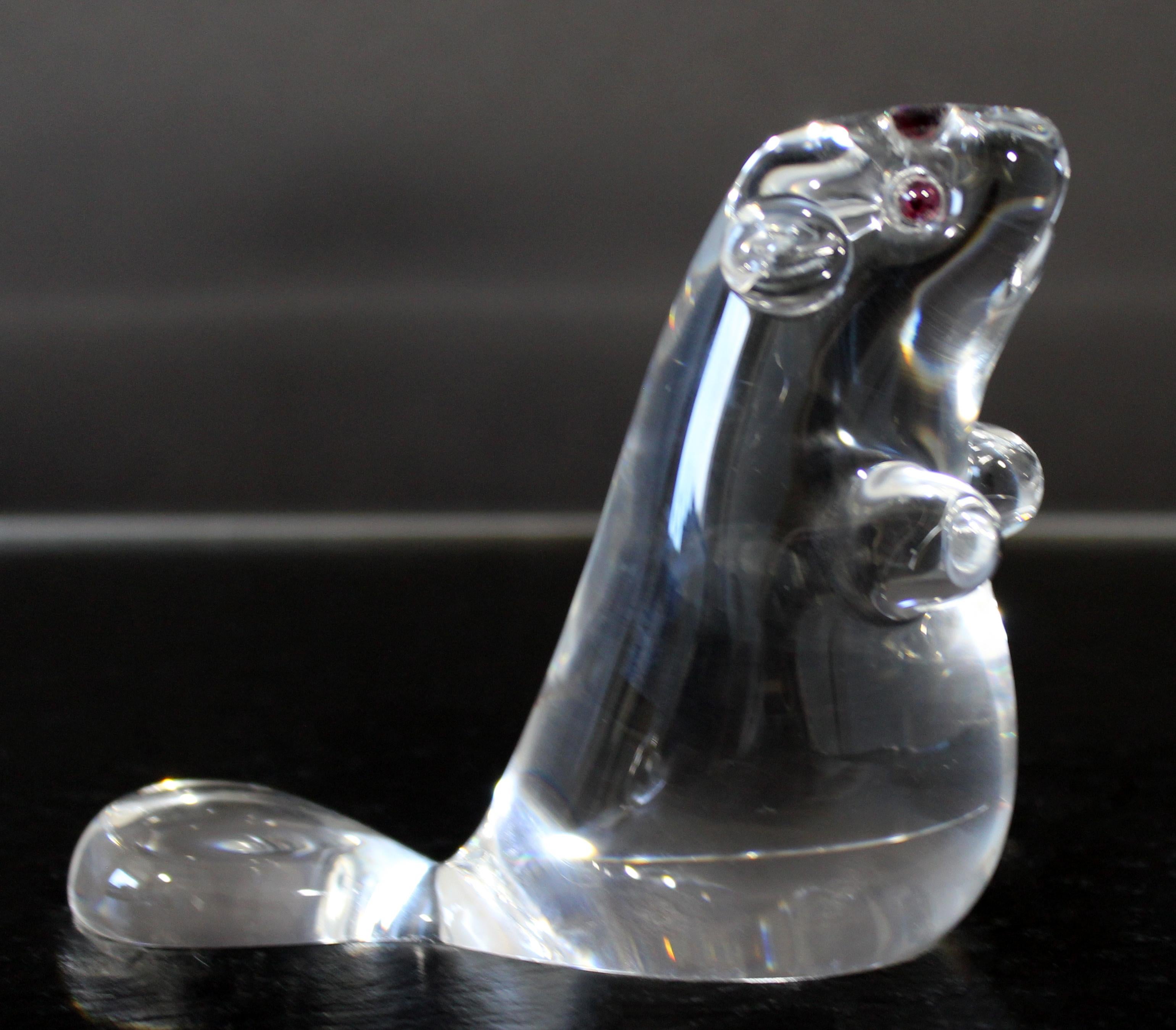 For your consideration is a gorgeous, small, Steuben signed, glass beaver statuette sculpture, with garnets for eyes. In excellent condition. The dimensions are 4.5