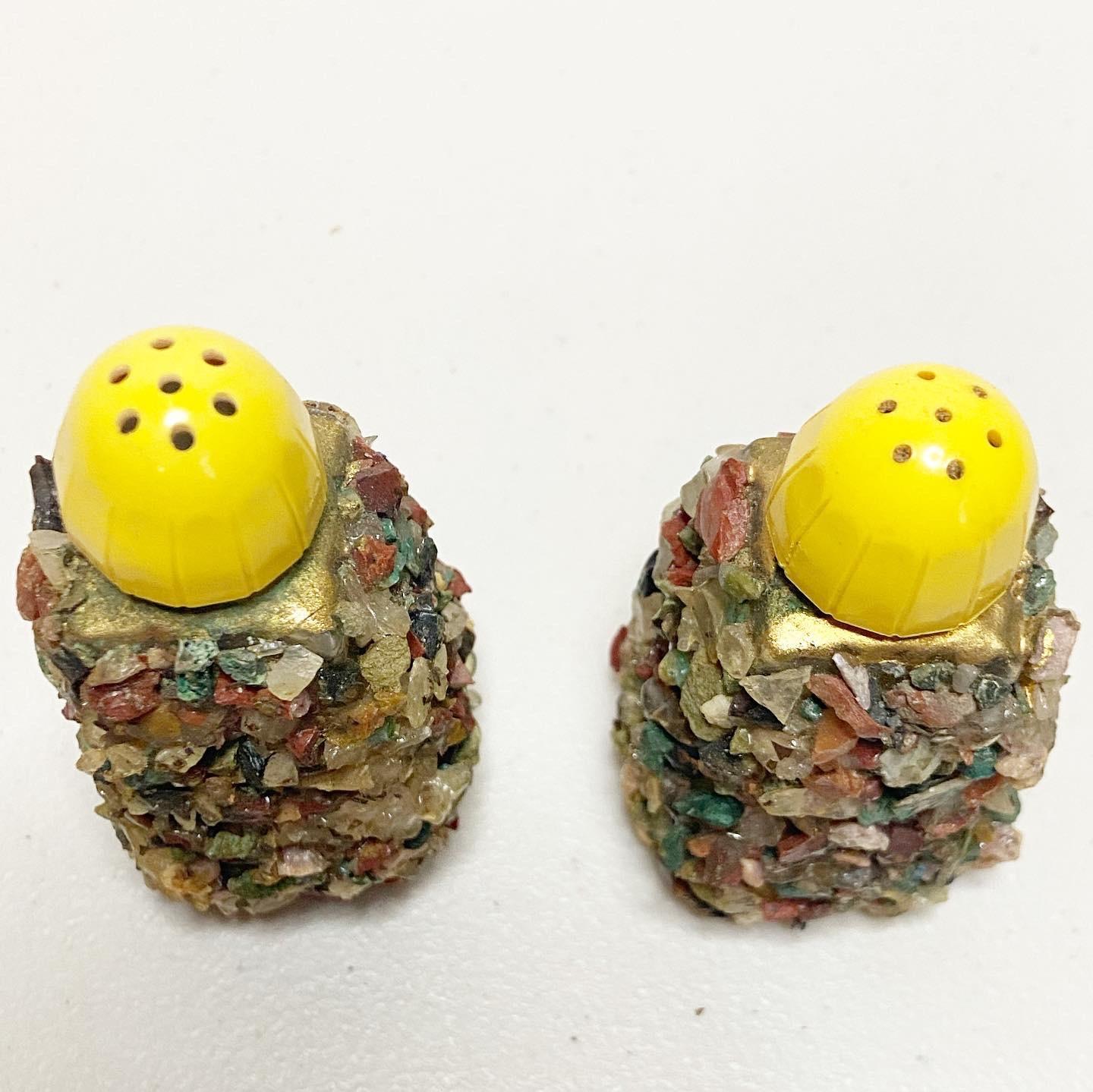 Beautiful multicolor stone covered salt and pepper shakers.