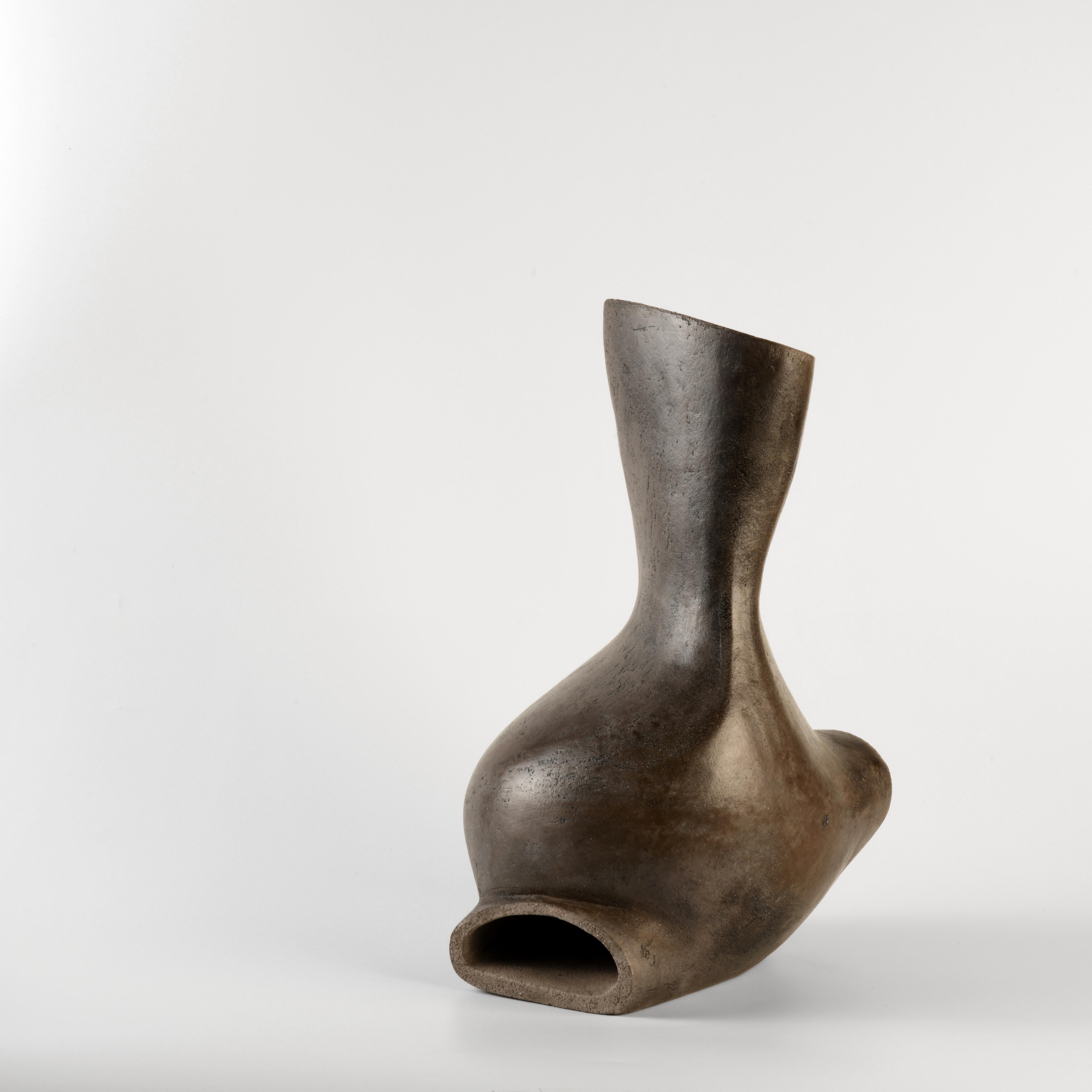 Contemporary stoneware sculpture by French artist Véra Rybaltchenko. The stoneware was fired at 1100 degrees and is therefore very resistant. The chamotte stoneware is patinated outside. and natural inside.Véra is first and foremost a sculptor,