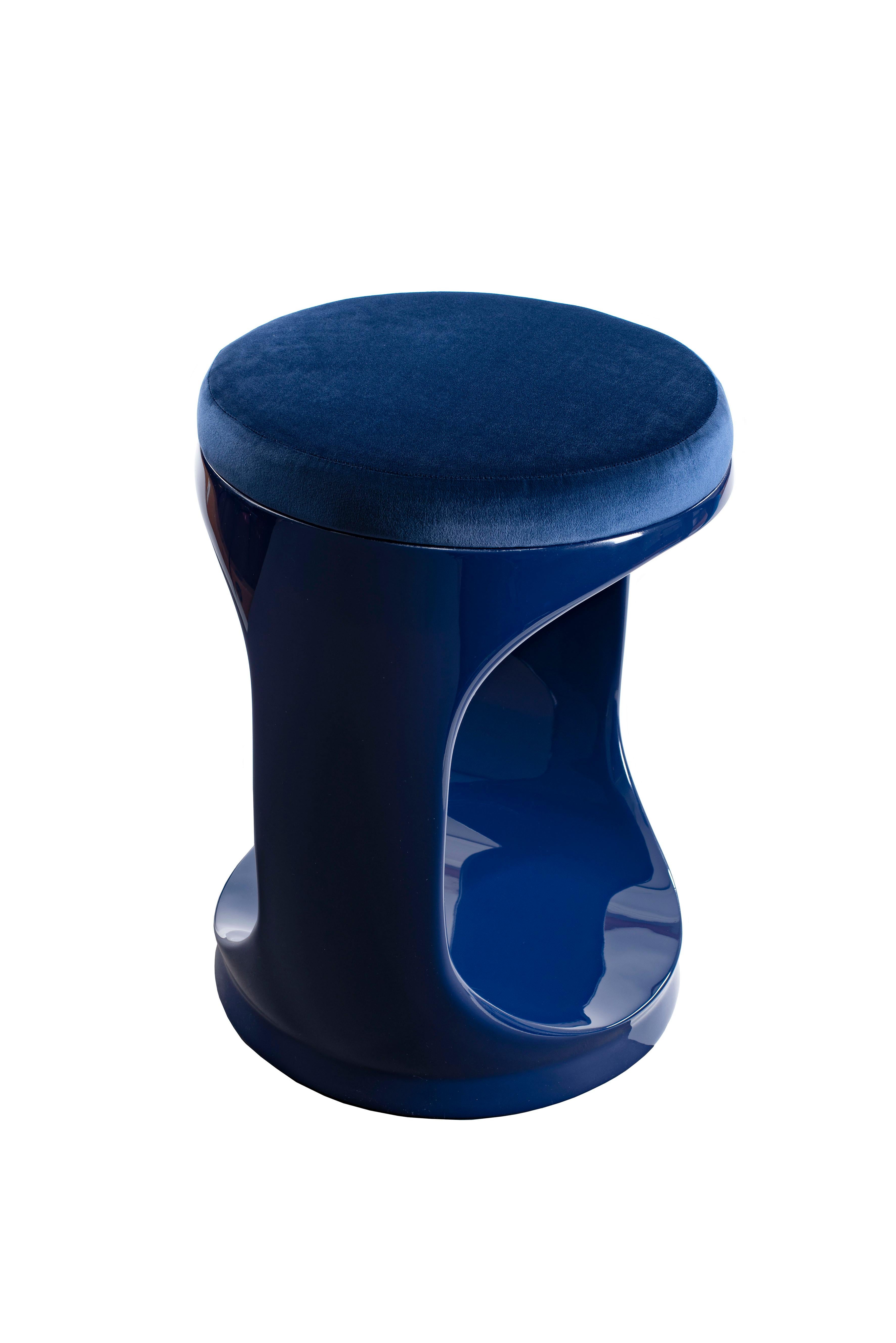 Contemporary Pouf by Cyril Rumpler Signet Ring, Hocker, Stool, navy blue.
These stools are available in a dozen colors and in a glossy finish. The black, white, navy blue, pink, red, turquoise, lilac, brown, green, and grey stools are available with