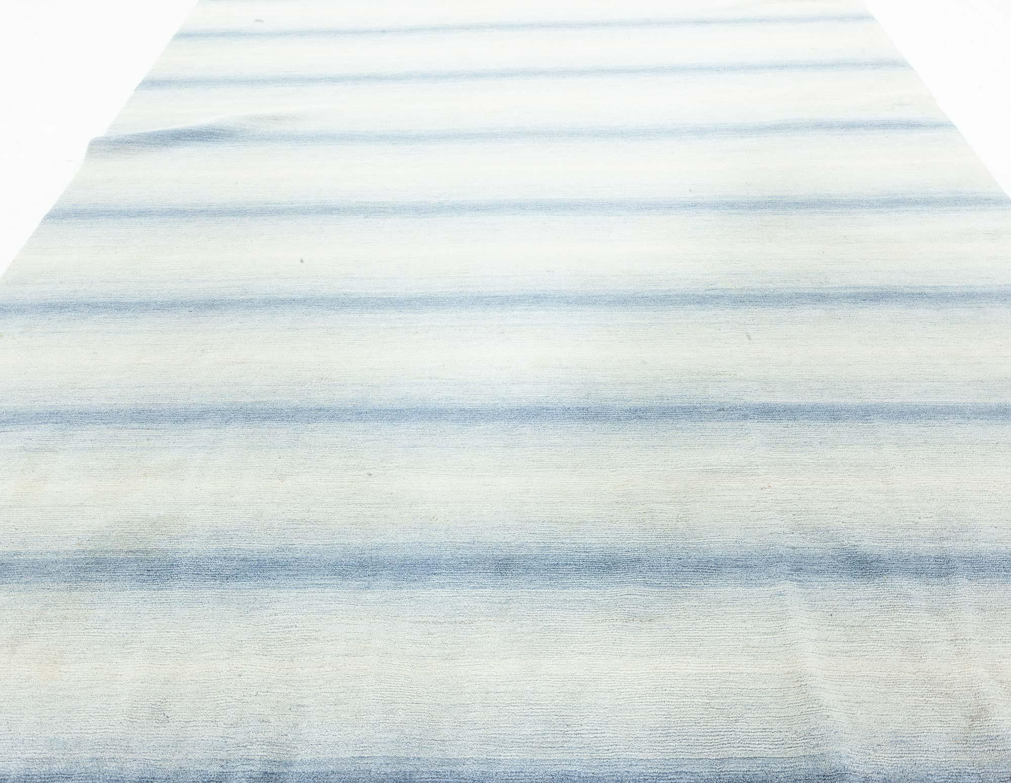 Contemporary striped blue hand knotted wool rug by Doris Leslie Blau.
Size: 6'0