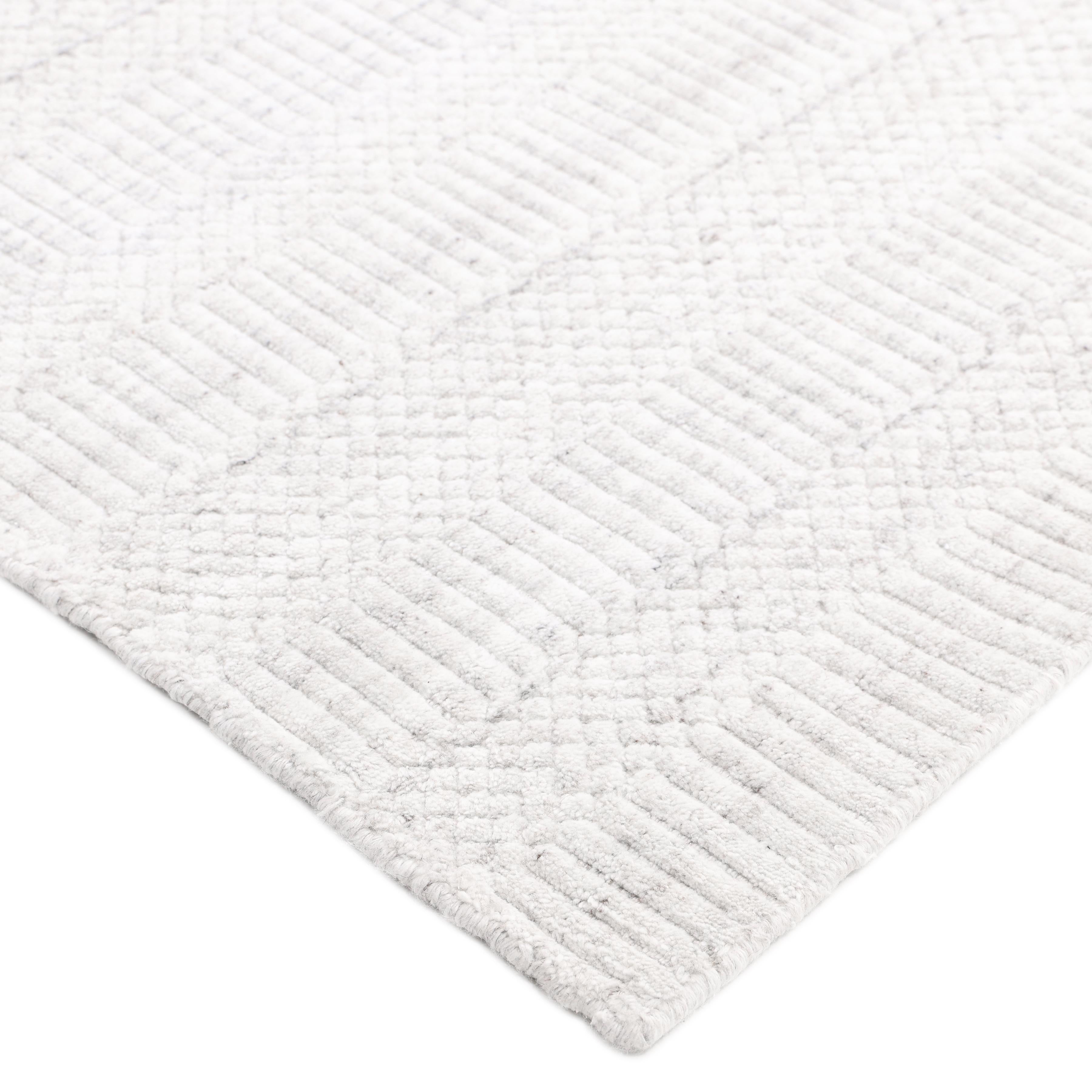 Subtle tone-on-tone stripes give the Solid collection a depth and sophistication all its own. These rugs can pull the disparate elements of a room into a beautifully cohesive whole; they can also introduce an unexpected but welcome jolt of color