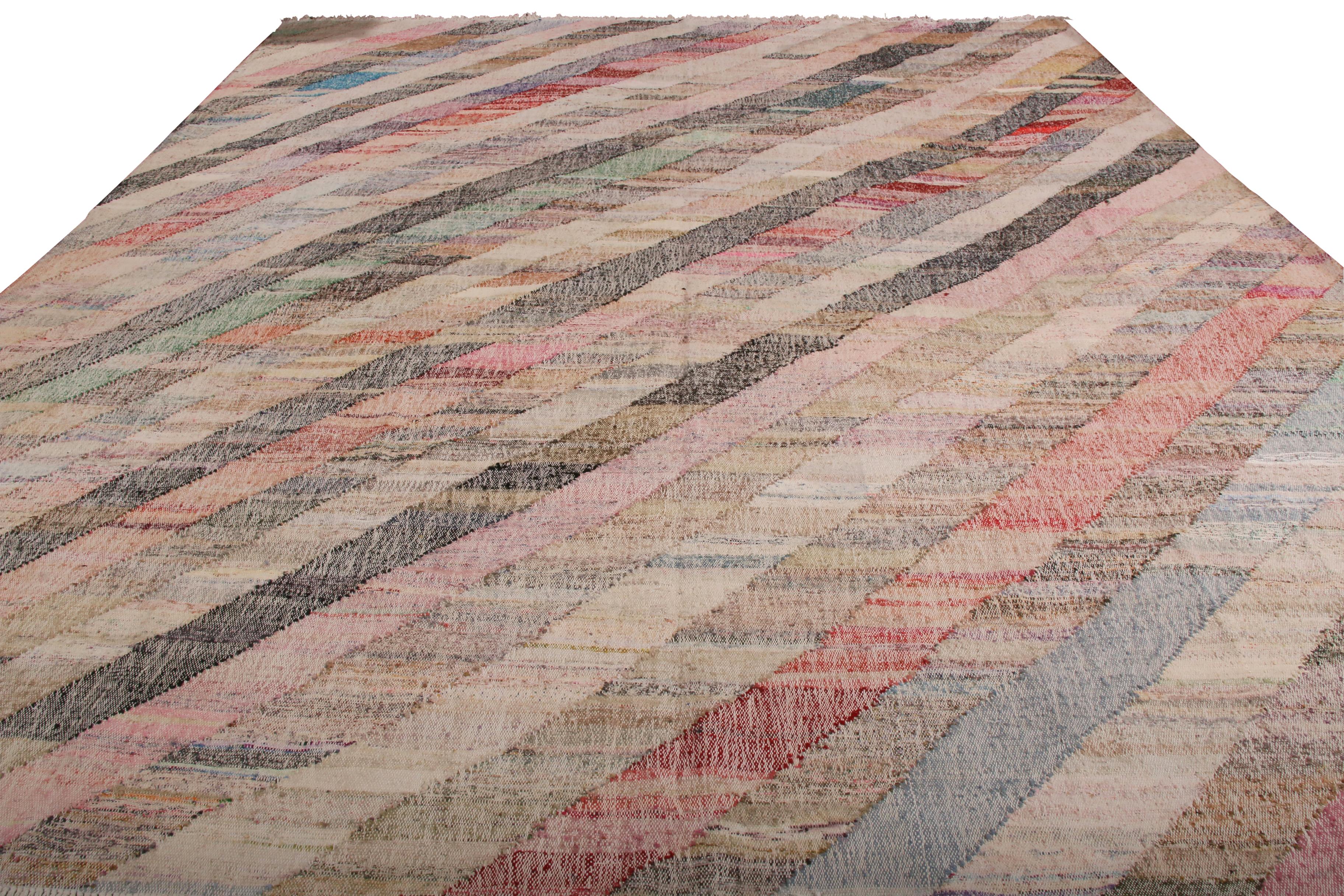 Sporting an eccentric play of soothing and rustic hues in the field, this contemporary Kilim represents a selection of distinct new patterns joining Rug & Kilim’s new and modern collection, uniquely handwoven from the yarns of Classic textiles and