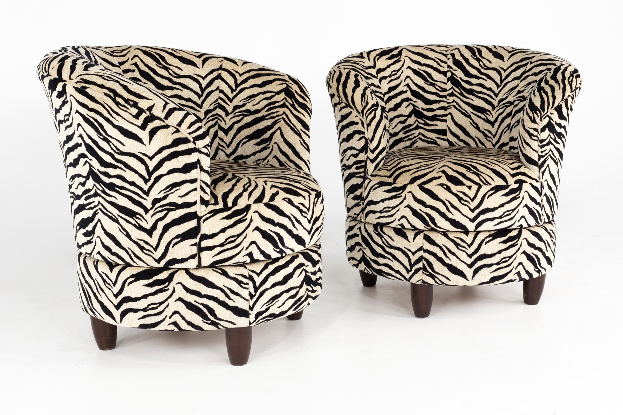 Contemporary striped swivel barrel chairs - pair

Each chair measures: 33 wide x 32 deep x 33 inches high, with a seat height of 17.5 and arm height of 29 inches

About Photos: We take our photos in a controlled lighting studio to show as much