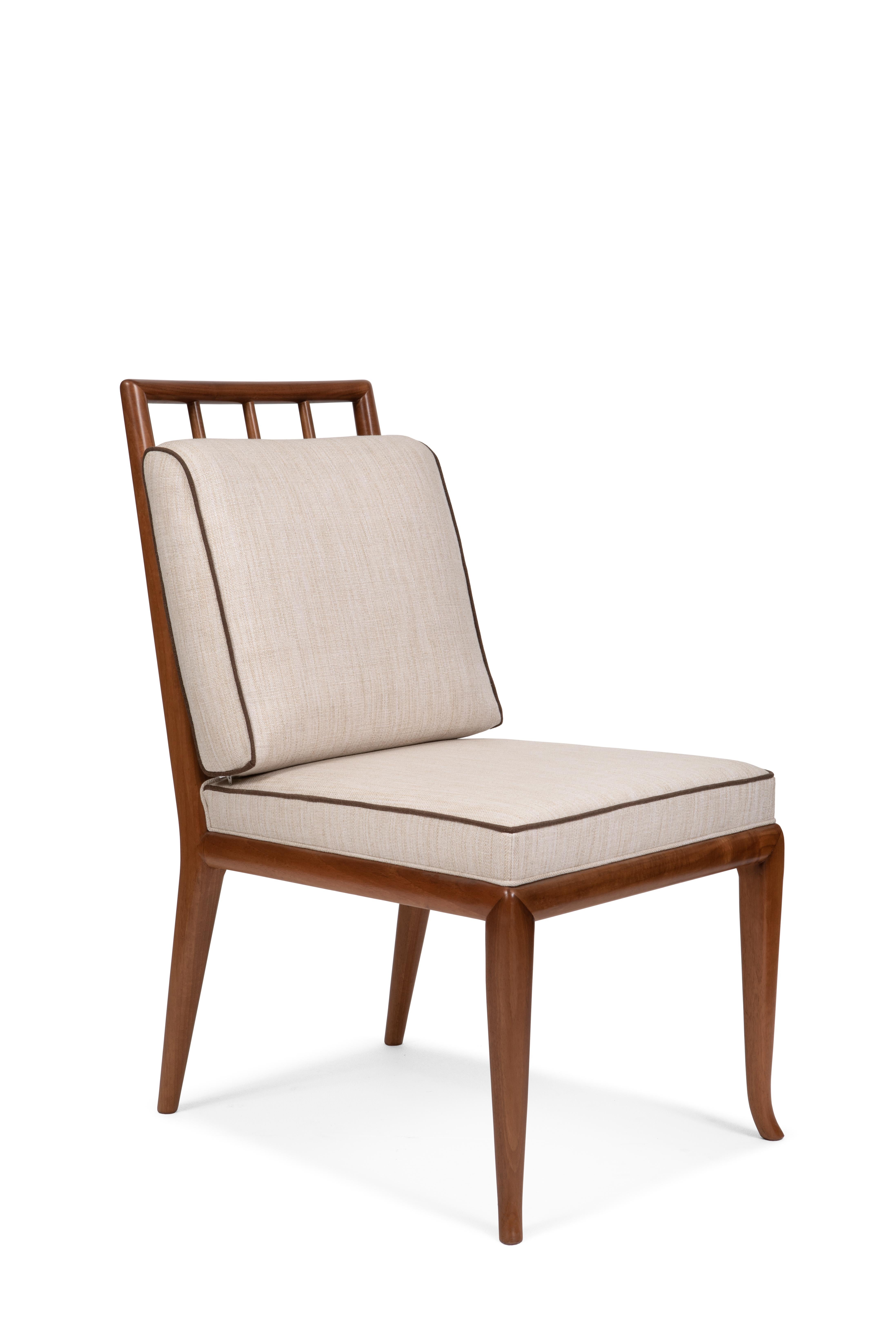 Dining chair with in contemporary style. Simple and elegant line designed for dining room. Walnut wood frame natural color polished.
Stuffed seat, wood back with pillow for backrest. It's possible to upholster with different color piping ( as