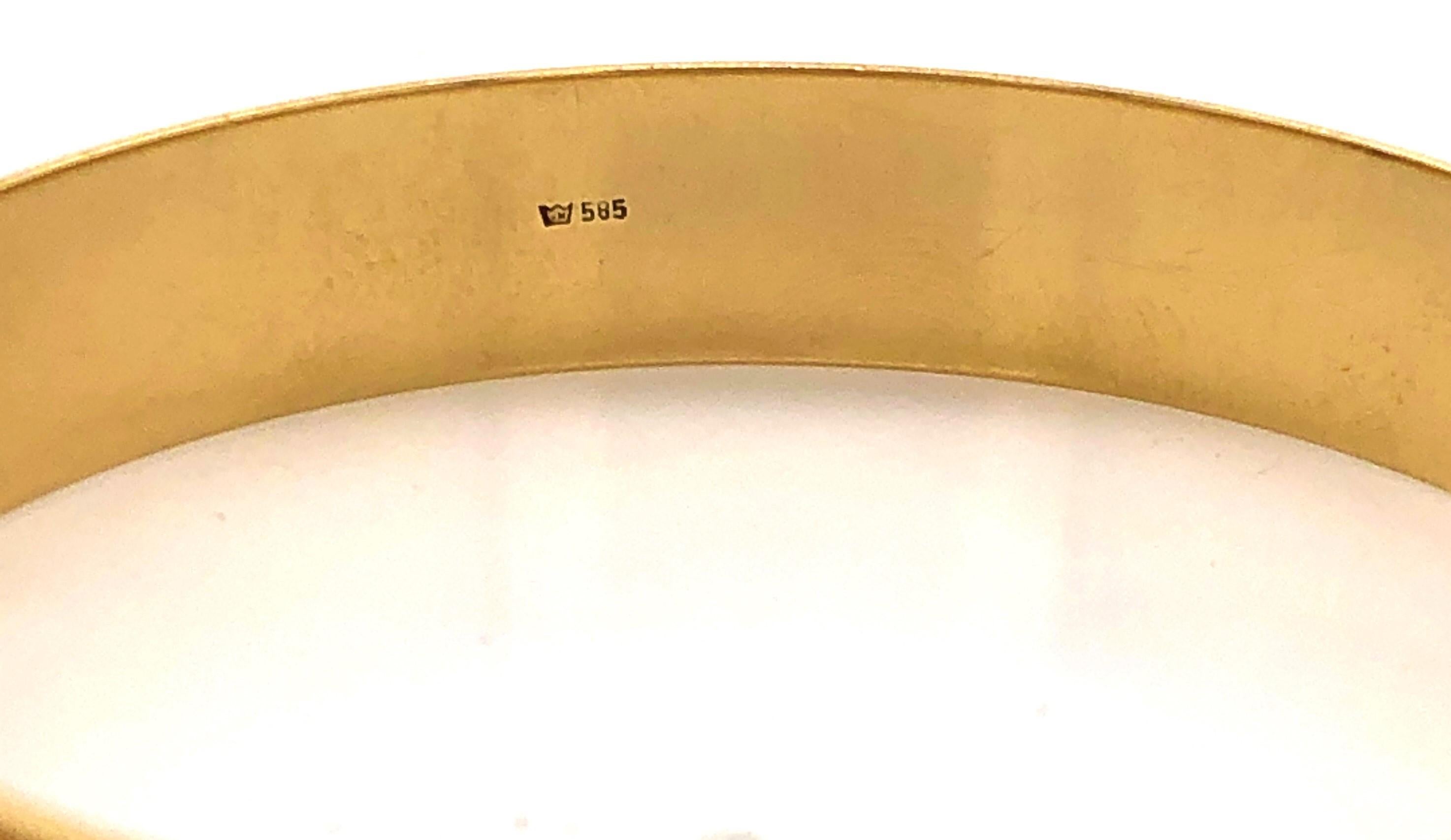 contemporary gold bangles