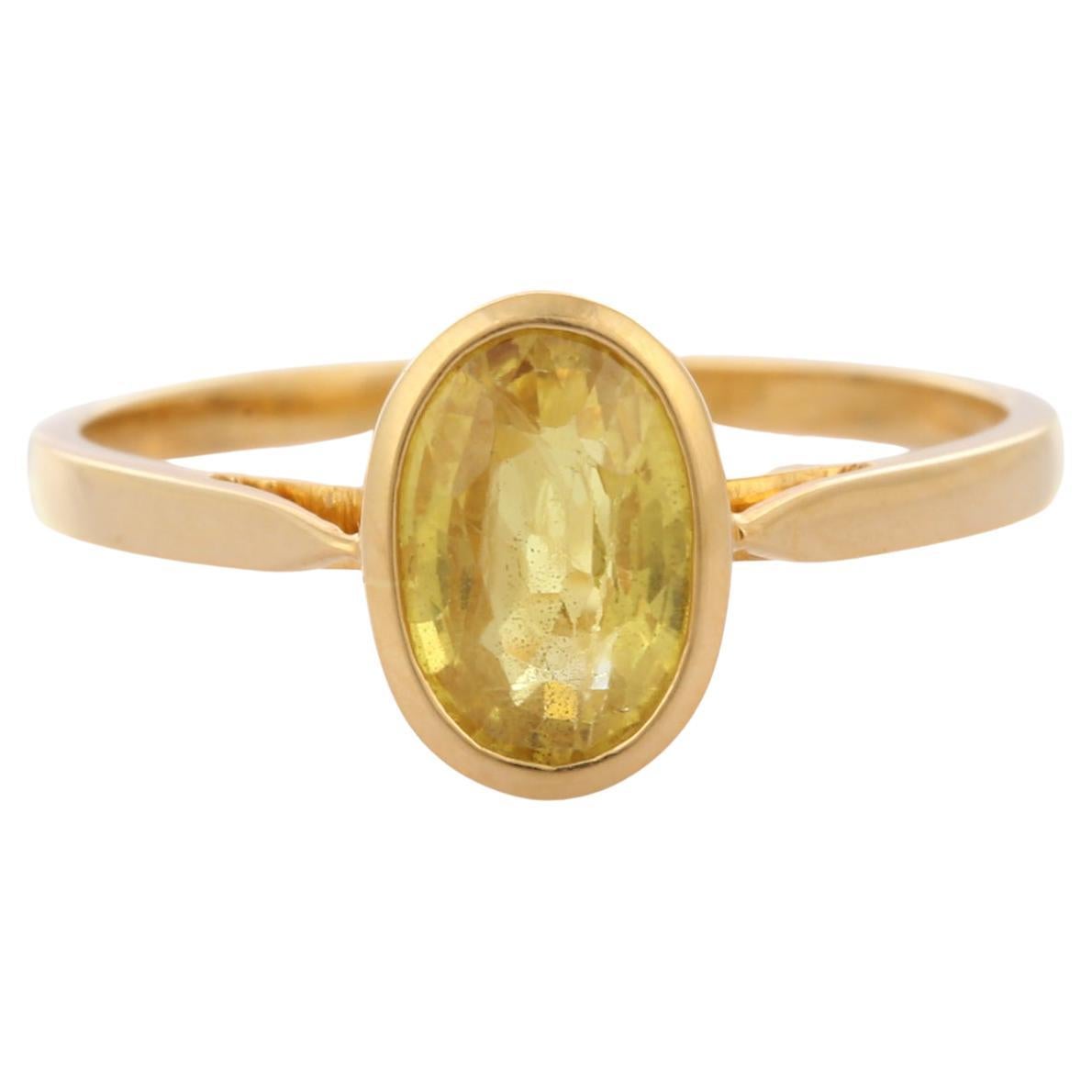 Anillo solitario de zafiro amarillo de estilo contemporáneo en oro amarillo de 18 quilates