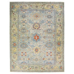 Tapis contemporain en laine bleu Sultanabad à motifs floraux faits à la main