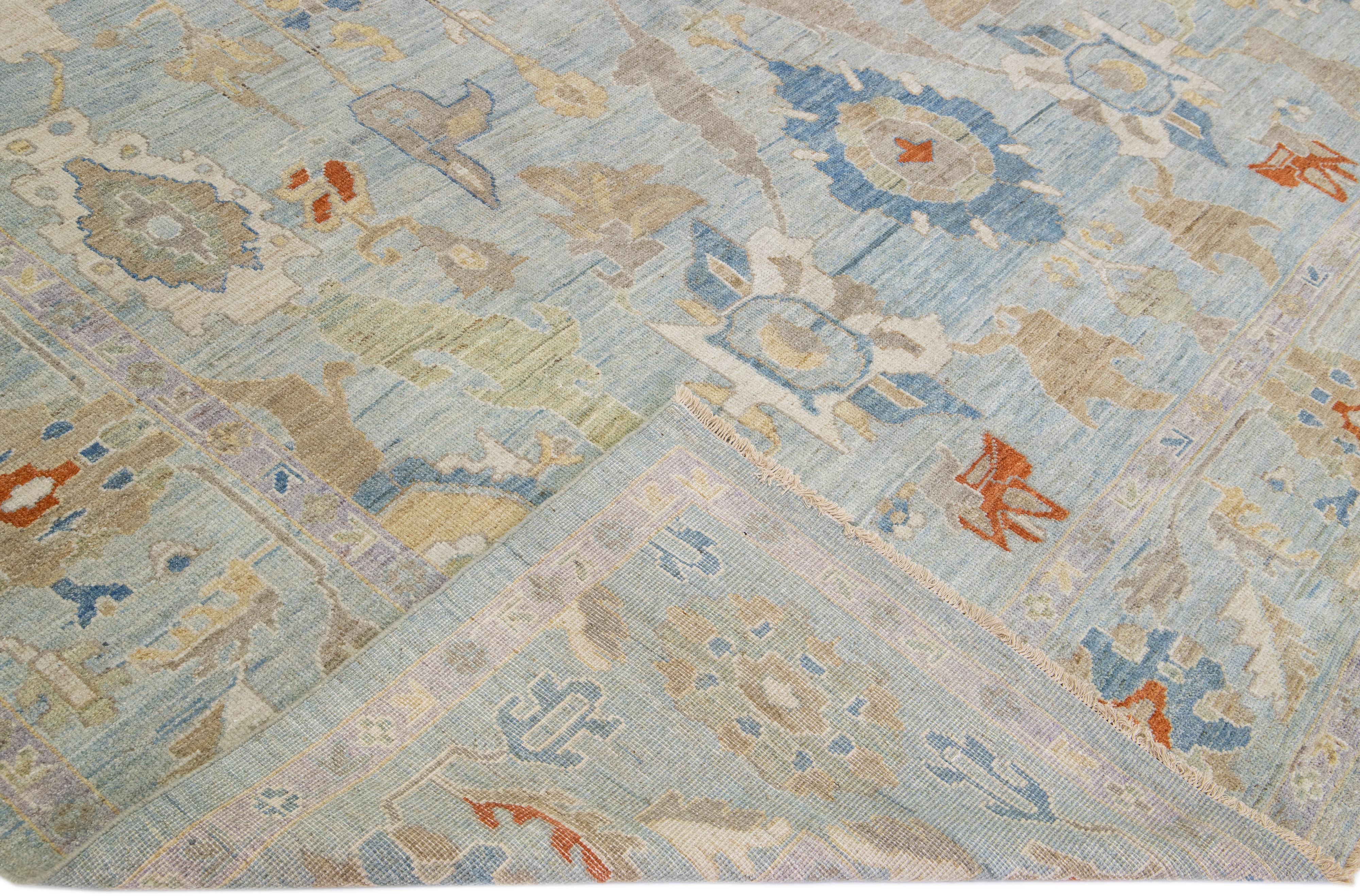 Beautiful modern Sultanabad hand-knotted wool rug with a blue field. This Sultanabad rug has multicolor accents in a gorgeous all-over classic floral pattern design.

This rug measures: 11
