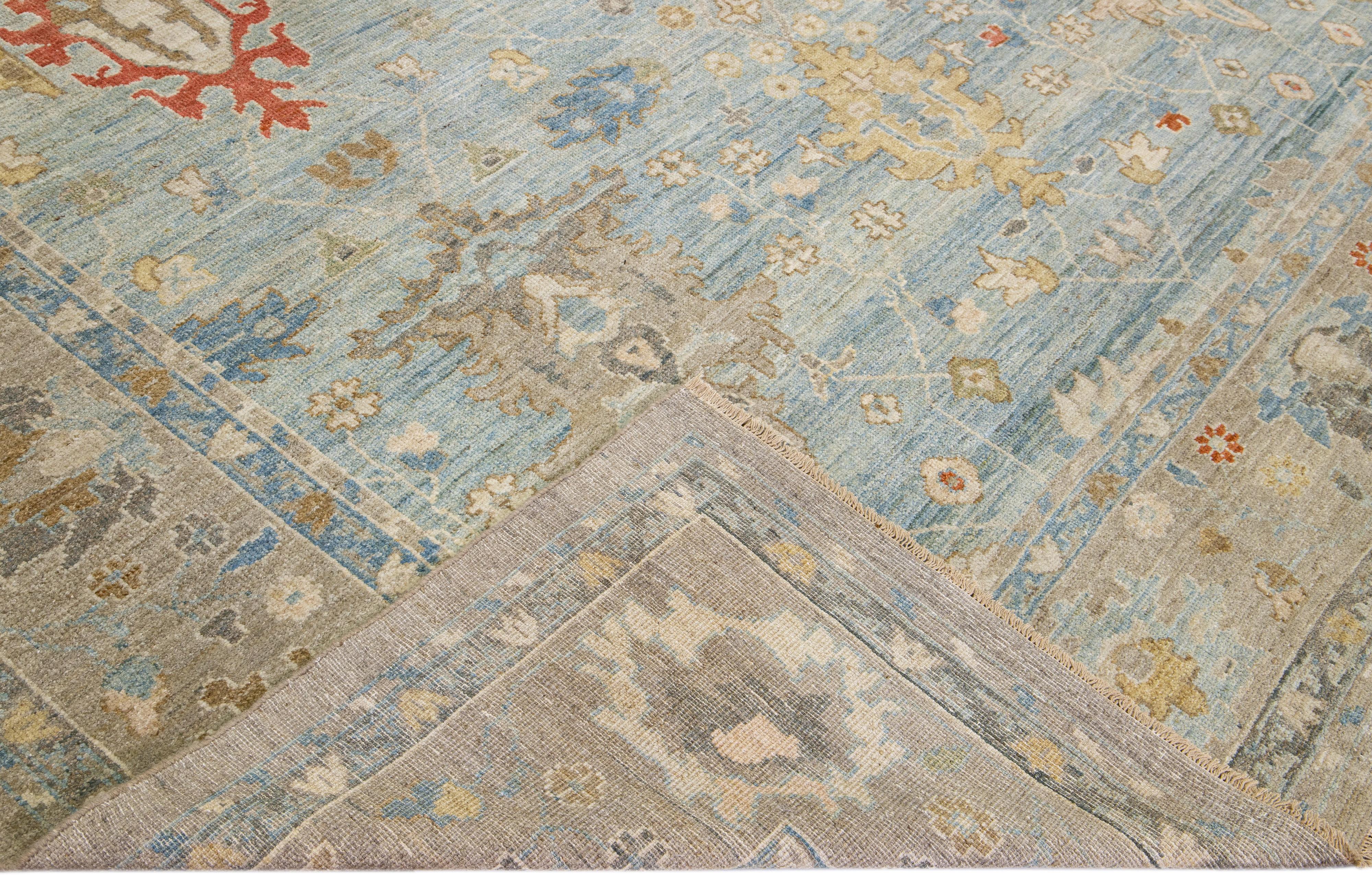 Beautiful modern Sultanabad hand-knotted wool rug with a light blue field. This Sultanabad rug has a brown frame and multicolor accents in a gorgeous all-over classic floral pattern design.

This rug measures: 10'2