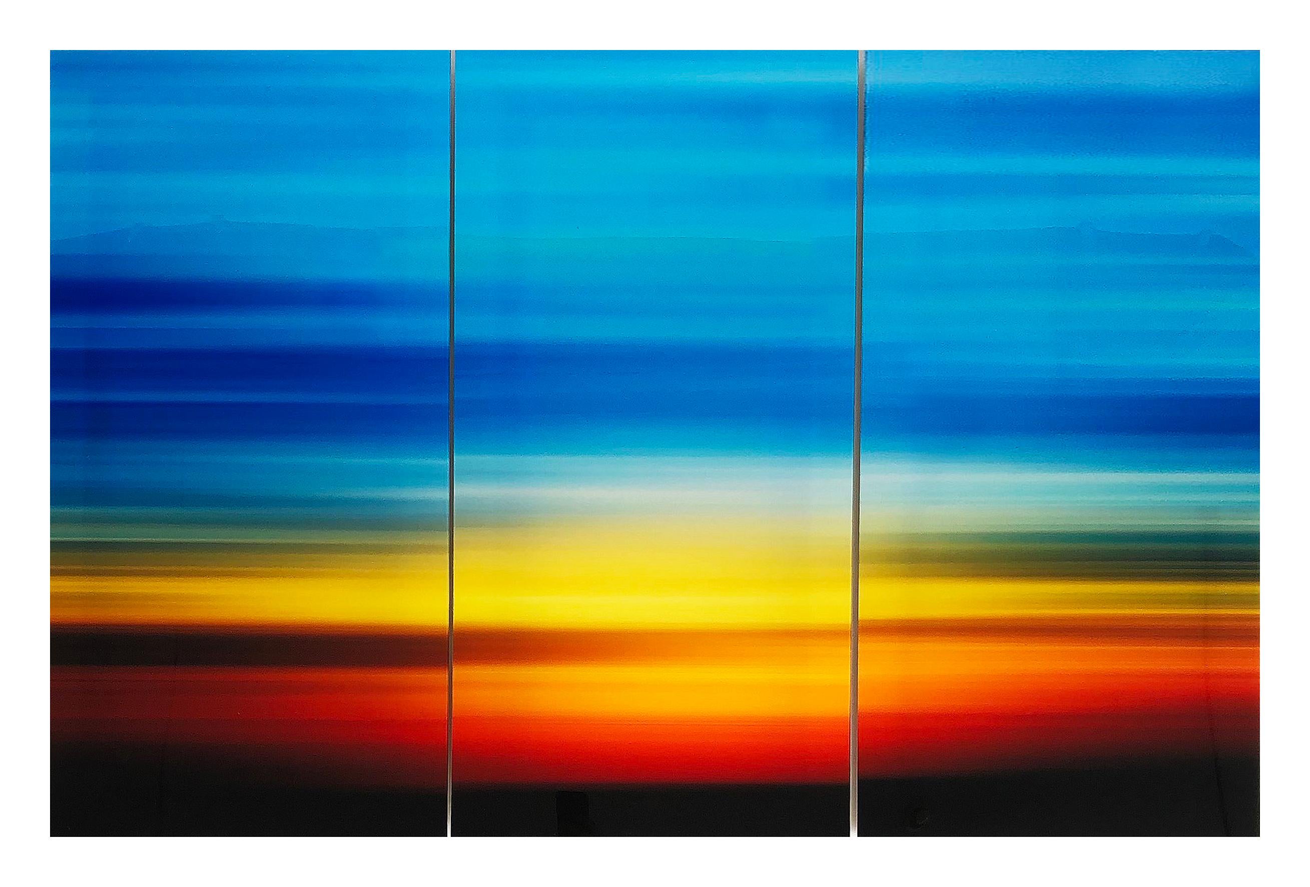 Contemporary Sunset Photographic Triptych- Set of 3

Offered for sale is an original enhanced sunset photographic triptych. The photographs are laminated in resin and supported with wood frames on verso. Each panel measures 20.12