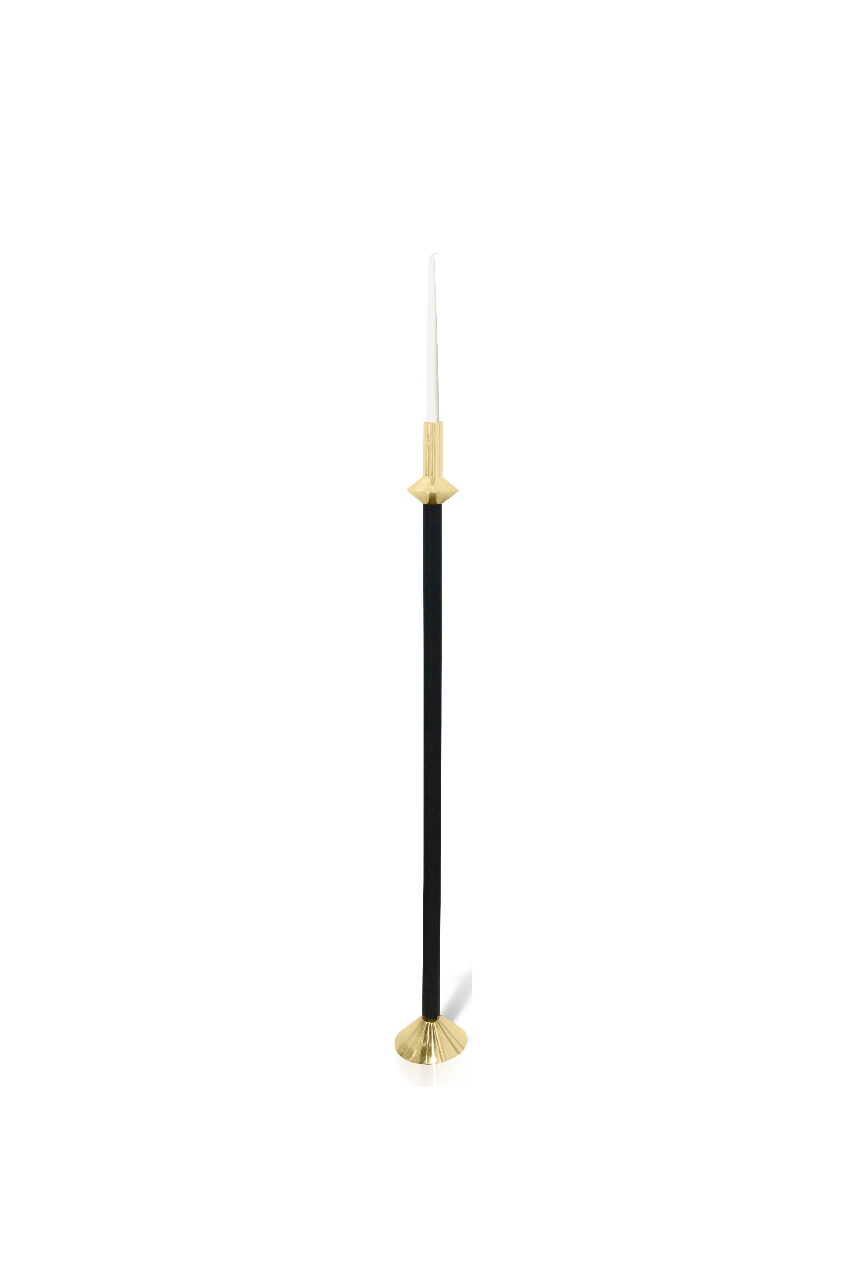 Part of Les Few's Annette collection, these contemporary, Minimalist floor candleholders are made by artisans in Sweden. They come in a polished or brushed finish.