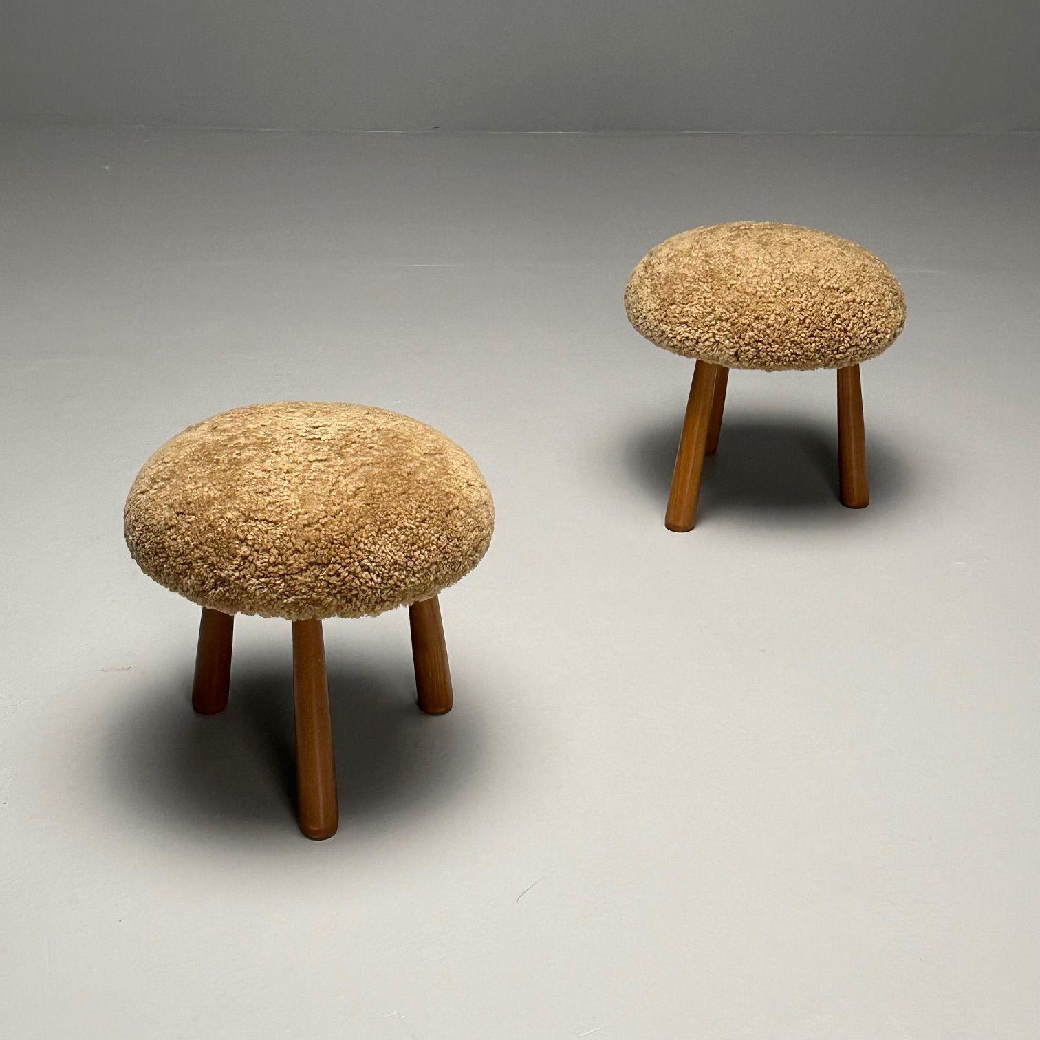 Two Contemporary Sheepskin Foot stools, Ottomans, Swedish Modern, Shearling
Contemporary organic form tri-pod footstools or ottomans. New comfortable foam cushioning and 17 mm high quality Australian curly sheepskin. Overall form and design inspired