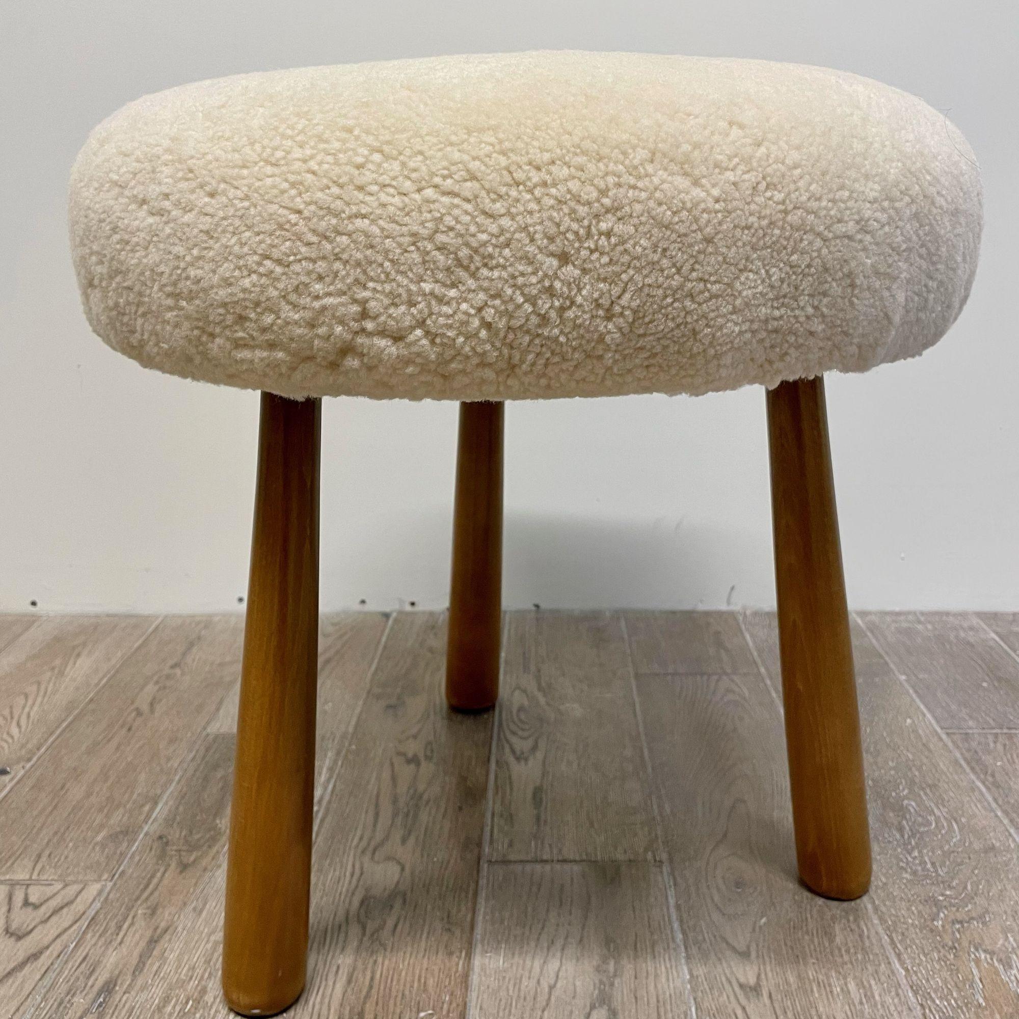 Contemporary Swedish Modern Style Sheepskin Footstool / Ottoman, Beige
Contemporary organic form tri-pod stool or ottoman. New comfortable foam cushioning and beige genuine shearling. Overall form and design inspired by Nordic design / Swedish
