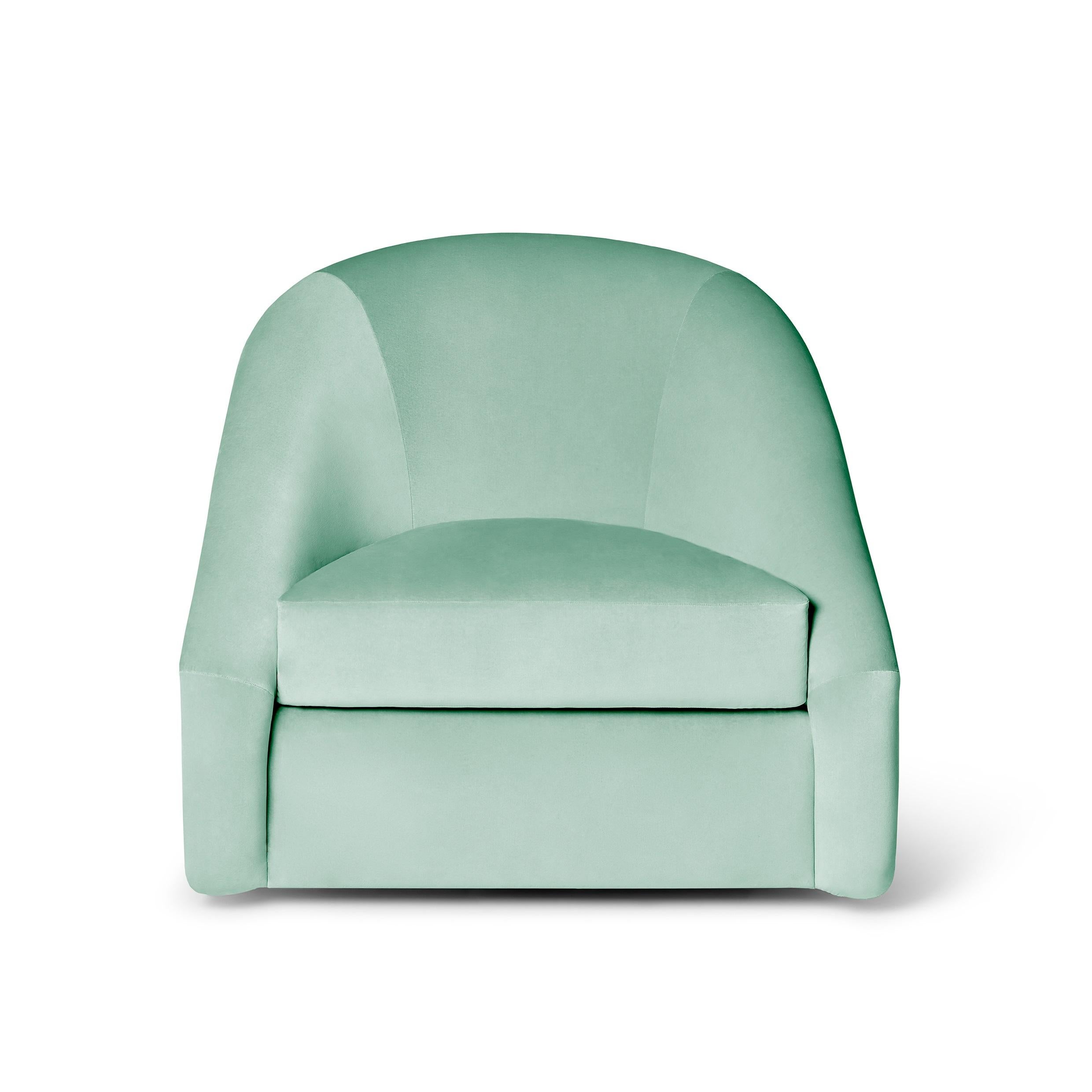 This swivel armchair offers functionality and style. Its ergonomic design ensures comfort, while the precise seaming showcases meticulous craftsmanship. The curved shapes enhance its visual appeal, and the swivel mechanism adds versatility.