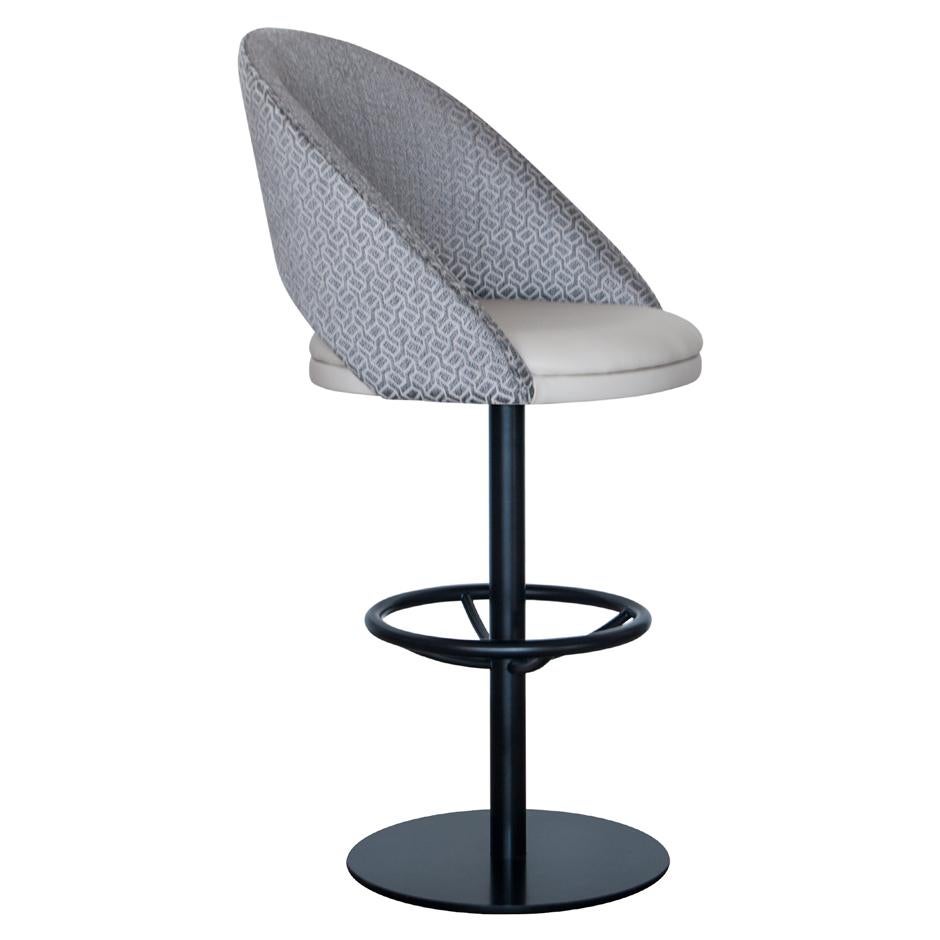 Contemporary swivel barstool made of black metal frame, fully upholstered in velvet with swivel base. Velvet is water repellent and stain resistant.
Available upholstered in various fabrics, leather or C.O.M.
Minimum Order: 2 
Dimensions:
Width