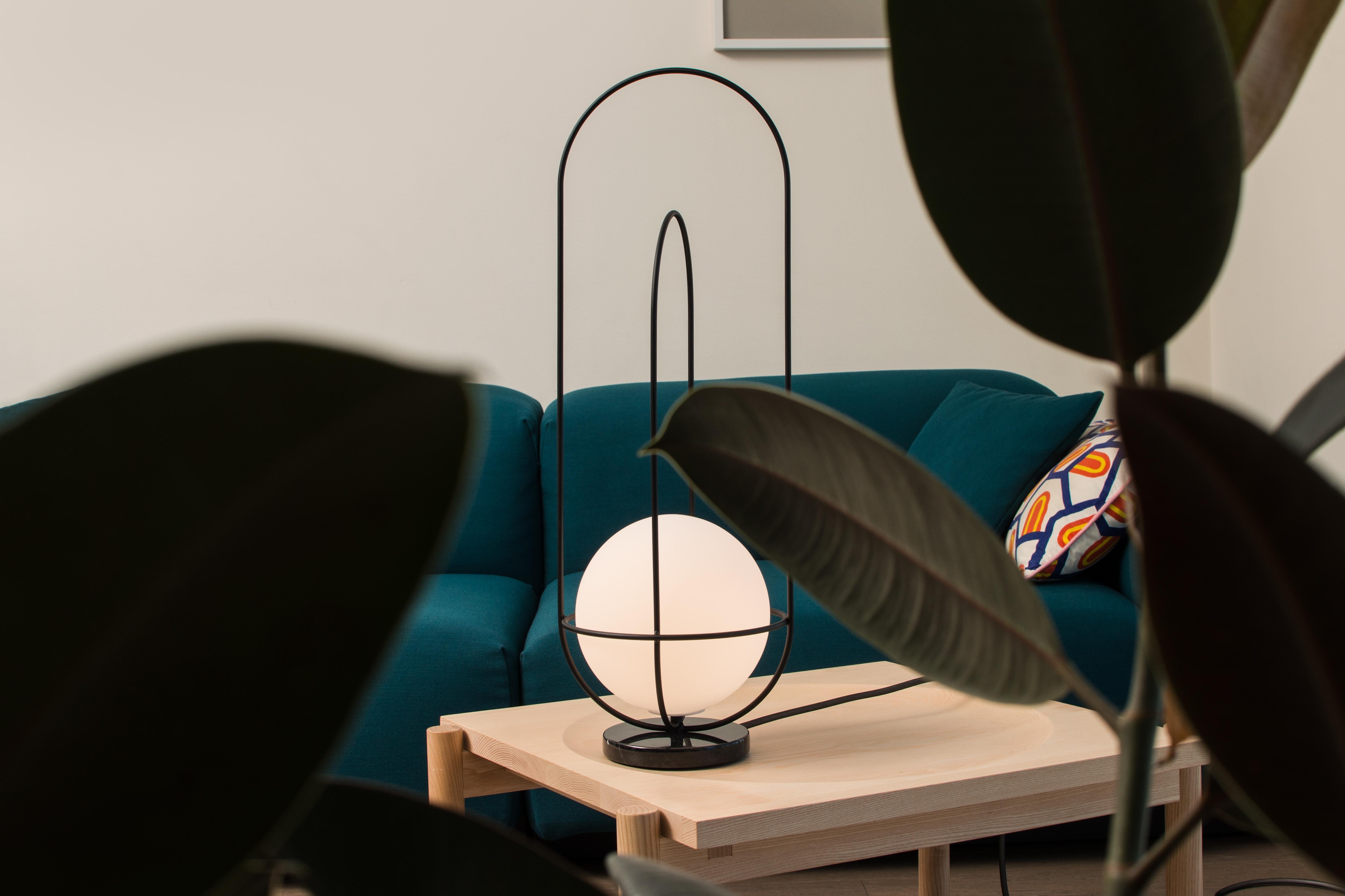 Table lamp orbit 2015
Design: Lukas Peet, Editor: AND Light

MATERIALS
– Steel Wire
– Etched Glass Globe
– Marble

Dimensions
70 x 25cm / 27.75”x 9.75”

ELECTRICAL
– 100V to 240V
– Hand dimmer on cord
– 1 x 4W G9 LED Lamp 
–