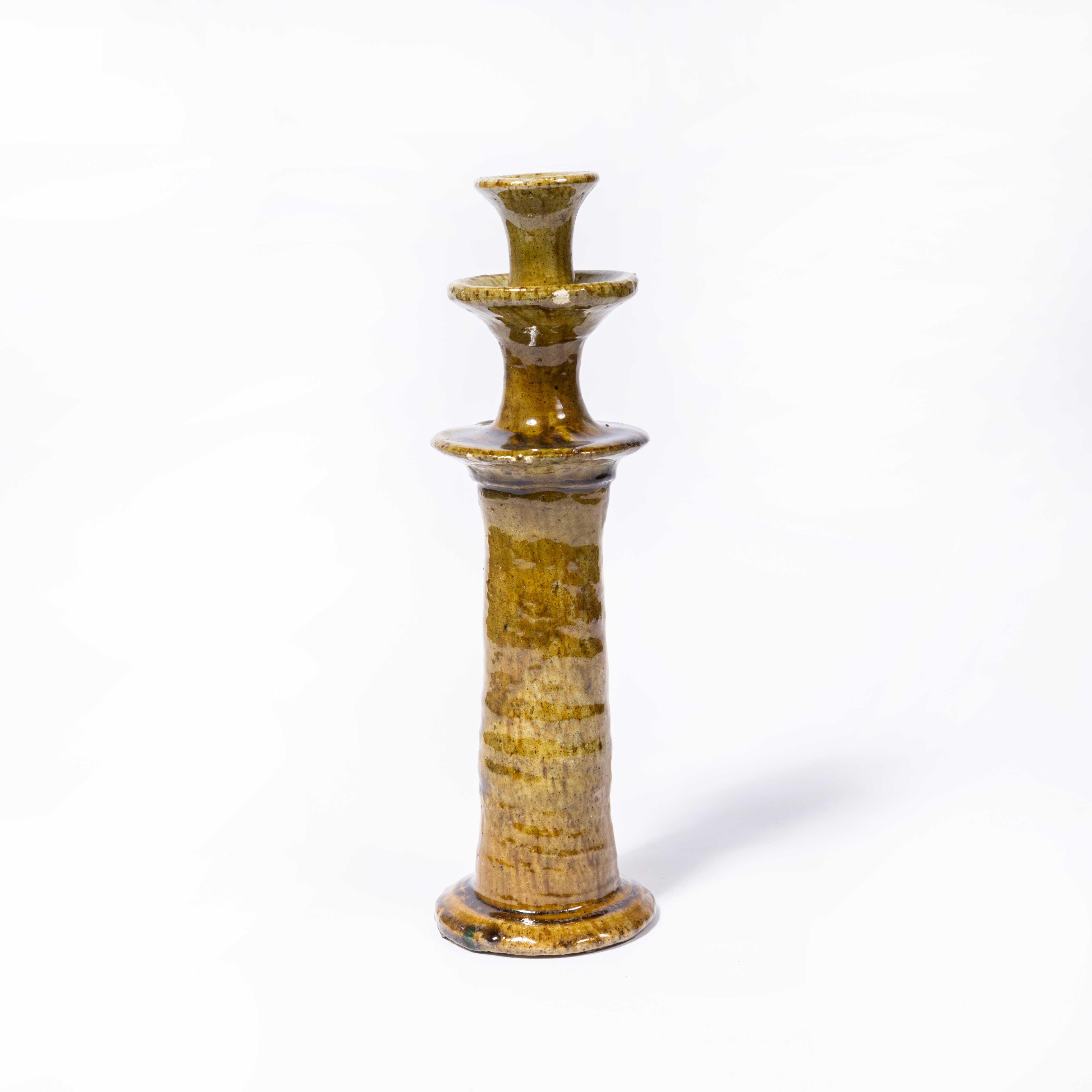 Contemporary Tamagroute Earth Candlestick - Morocco. Tamegroute is a small Moroccan village simply known for it's rich traditional ceramics. The clay is cut by hand from the banks of the River Draa, moulded by hand, not wheel turned, and then left