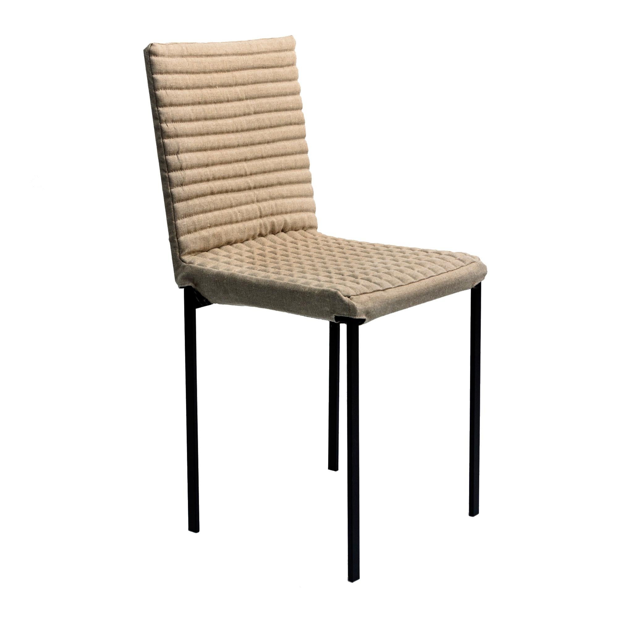 The ‘Tanit Soft’ chairs are available with an option that makes them unique objects in terms of richness and comfort: an upholstered and quilted cover of various colors that is put on the frame and fastened with a Velcro strap. 
The upholstered