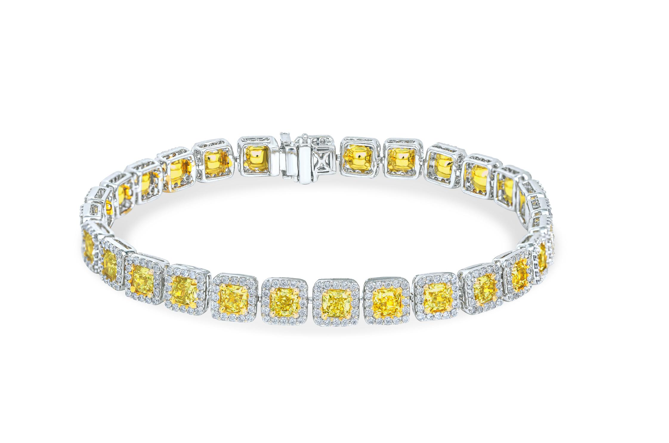 A breathtaking contemporary tennis bracelet made up of natural yellow diamonds and colorless diamonds. Perfectly matched radiant yellow diamonds are mounted with a halo of white diamonds surround each of them. Calibrated to perfection in a straight